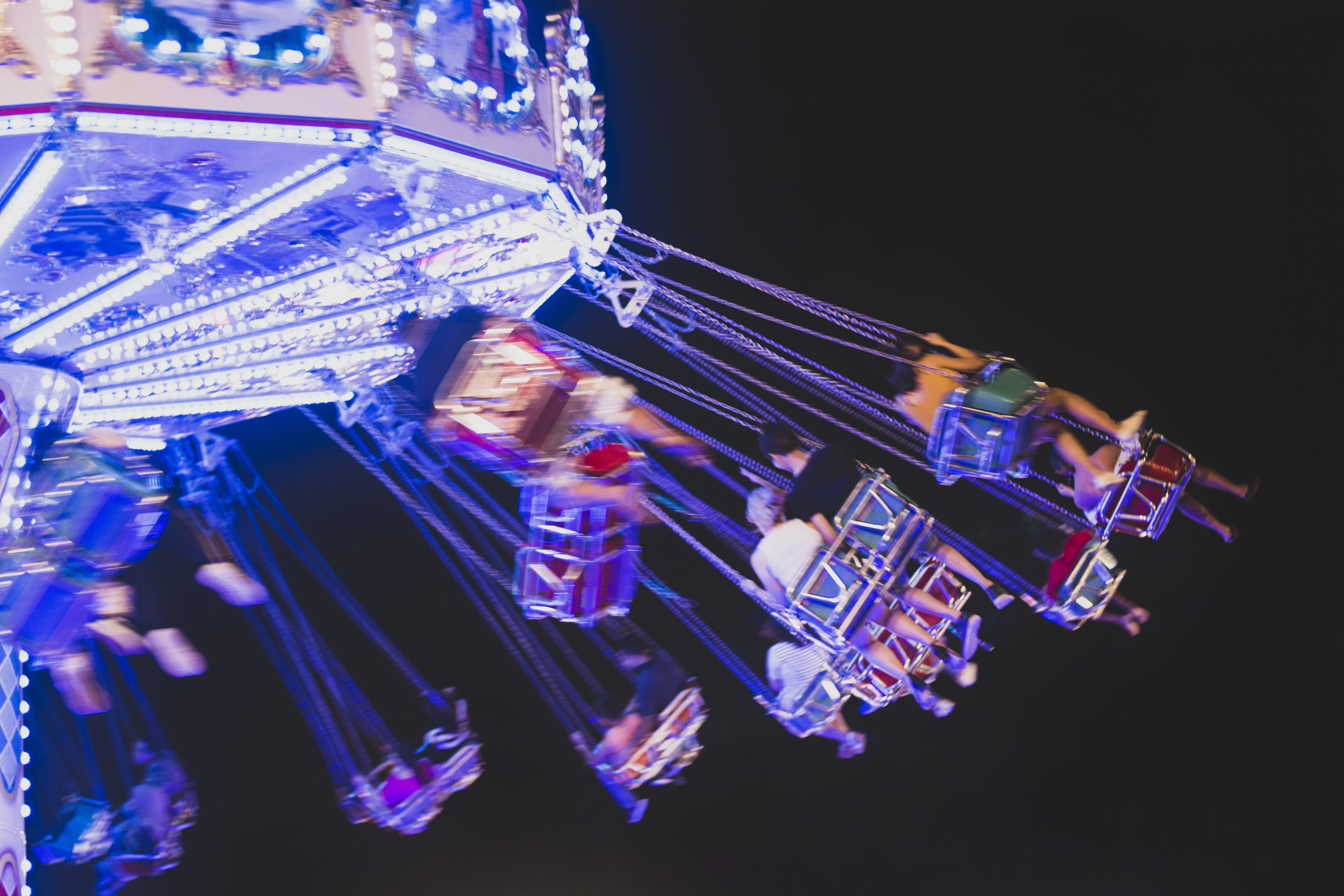 multicolor carousel, black background, studio shot, technology