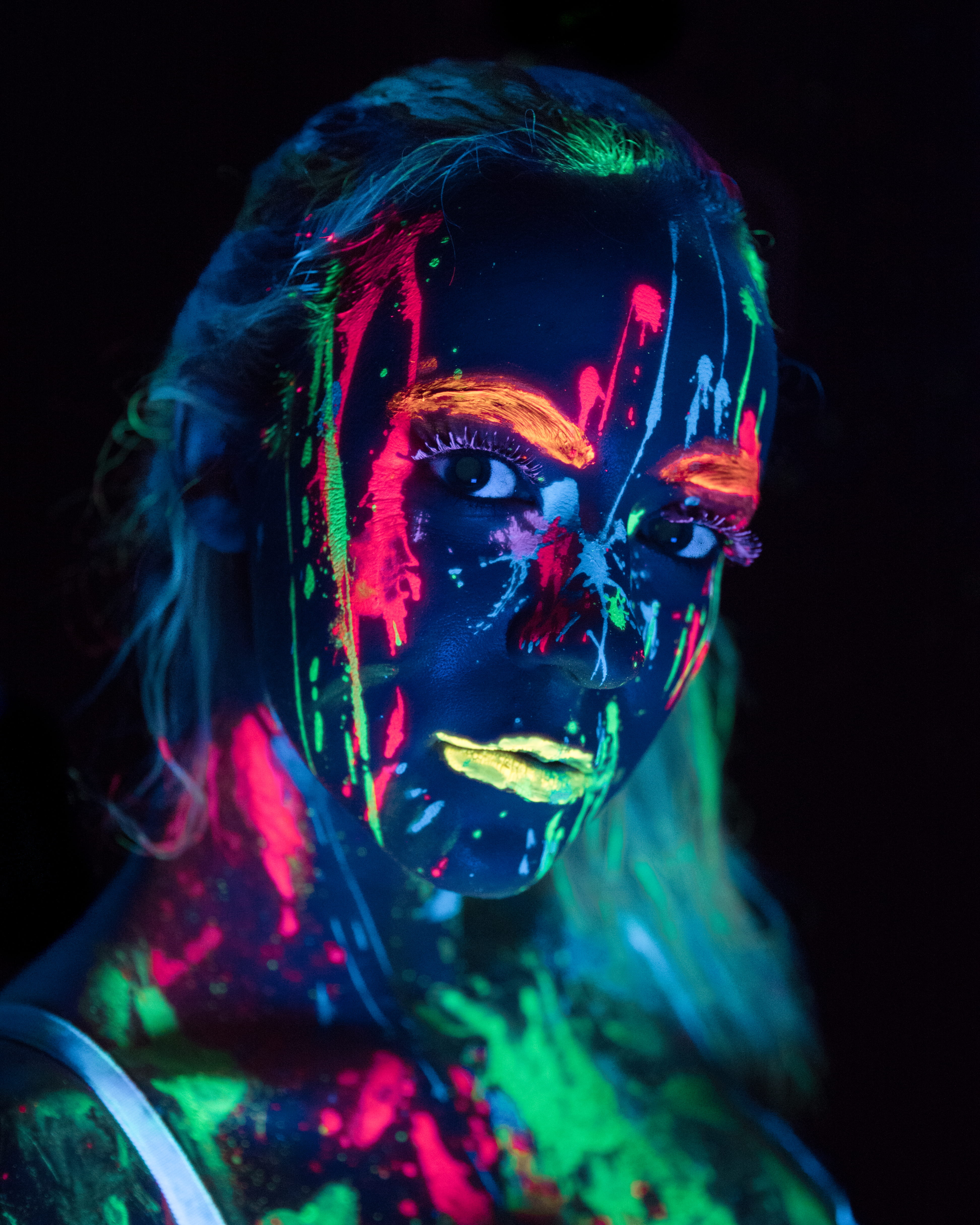 woman with glow in the dark body paint, portrait, neon, neon paint