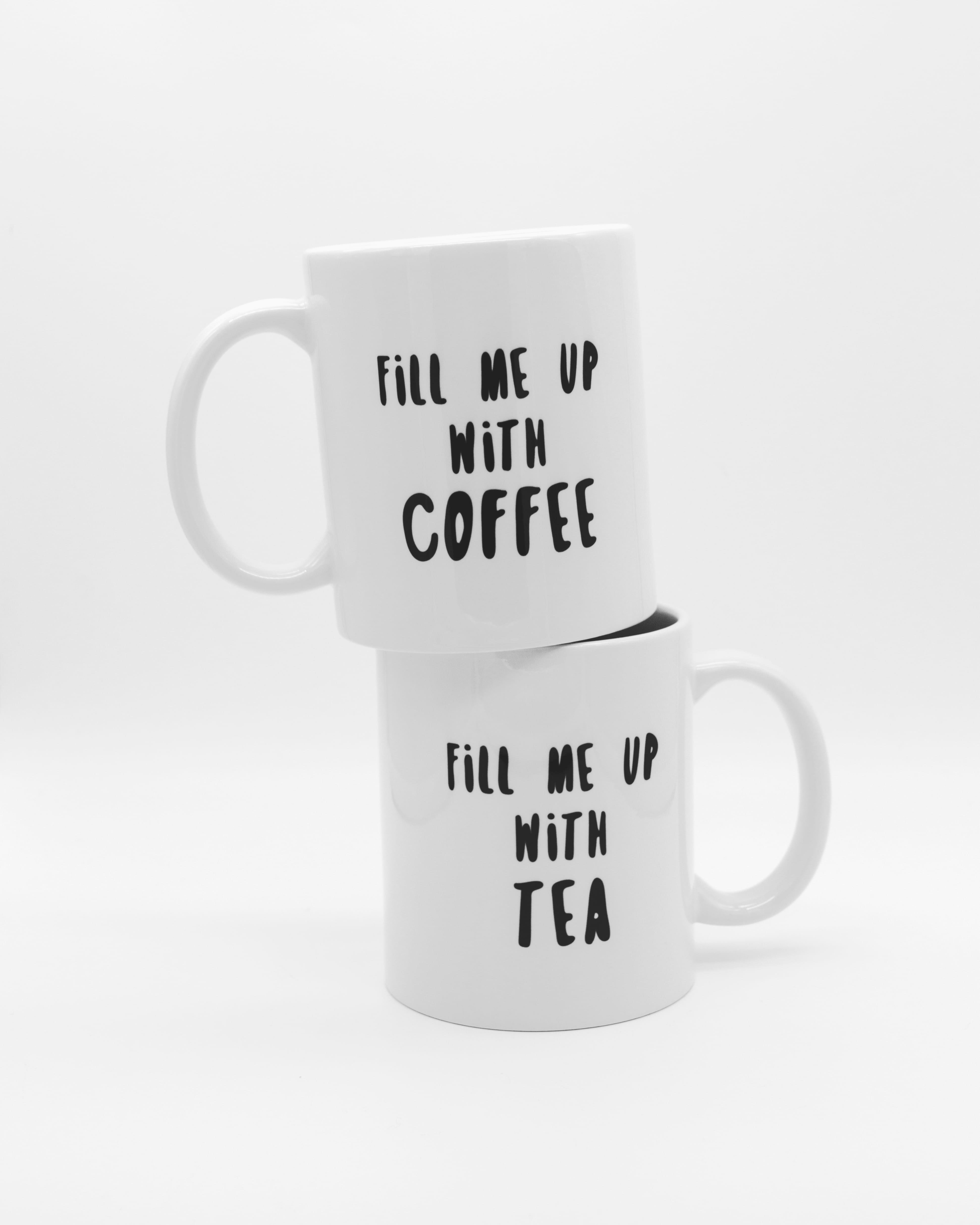 two white ceramic mugs, text, western script, cup, studio shot