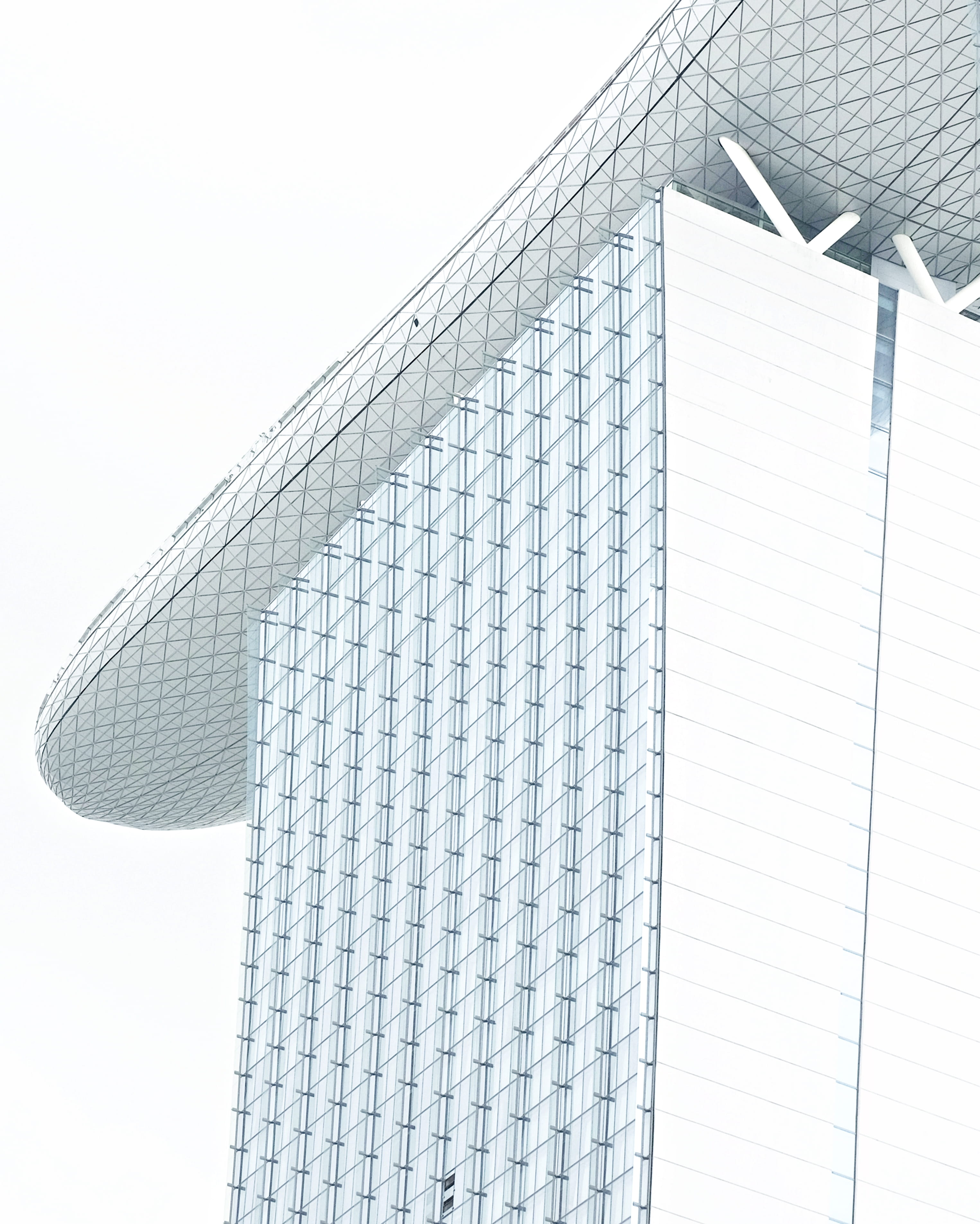 glass building under white clouds, built structure, building exterior