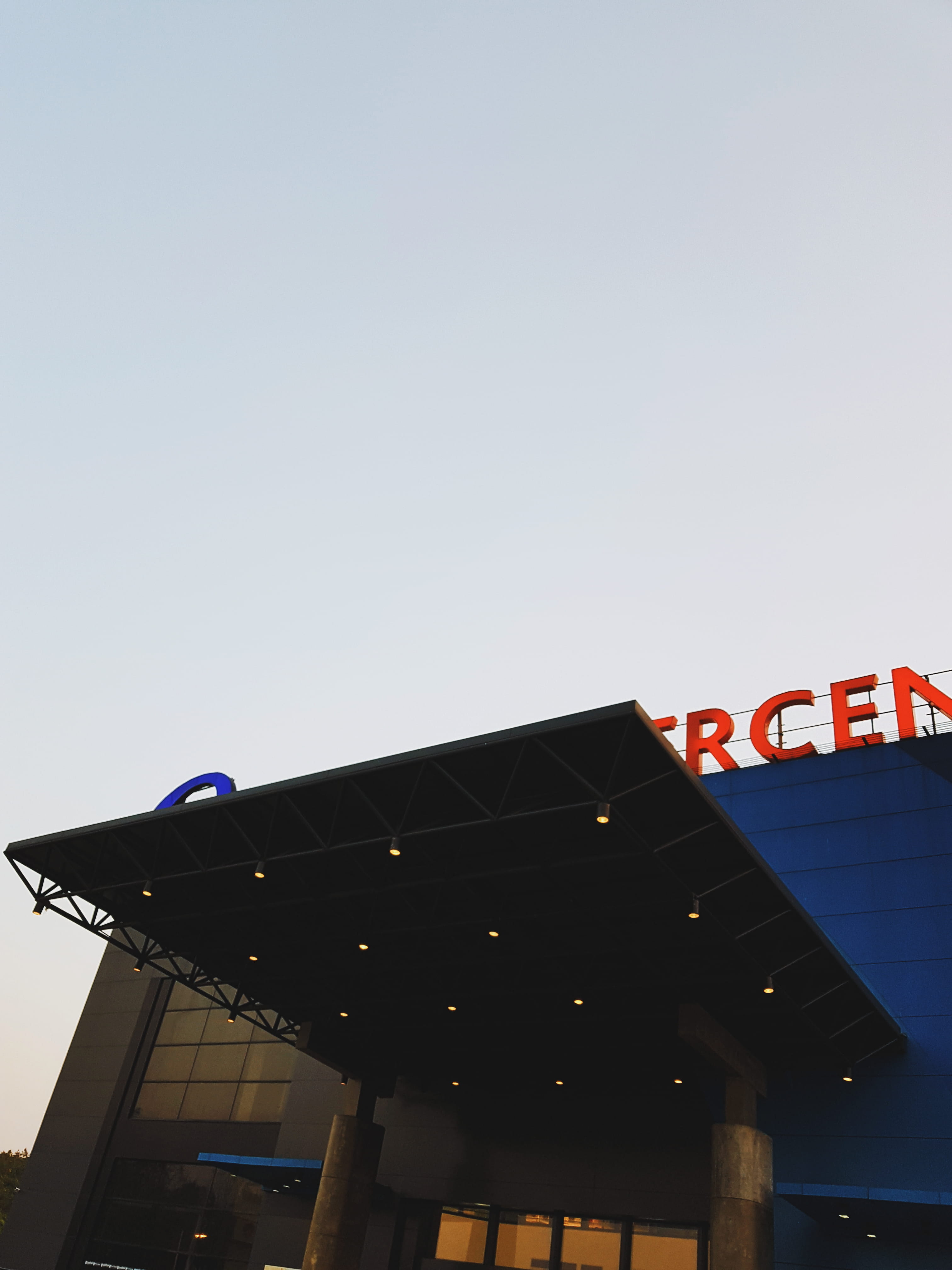 sky, architecture, western script, text, built structure, building exterior