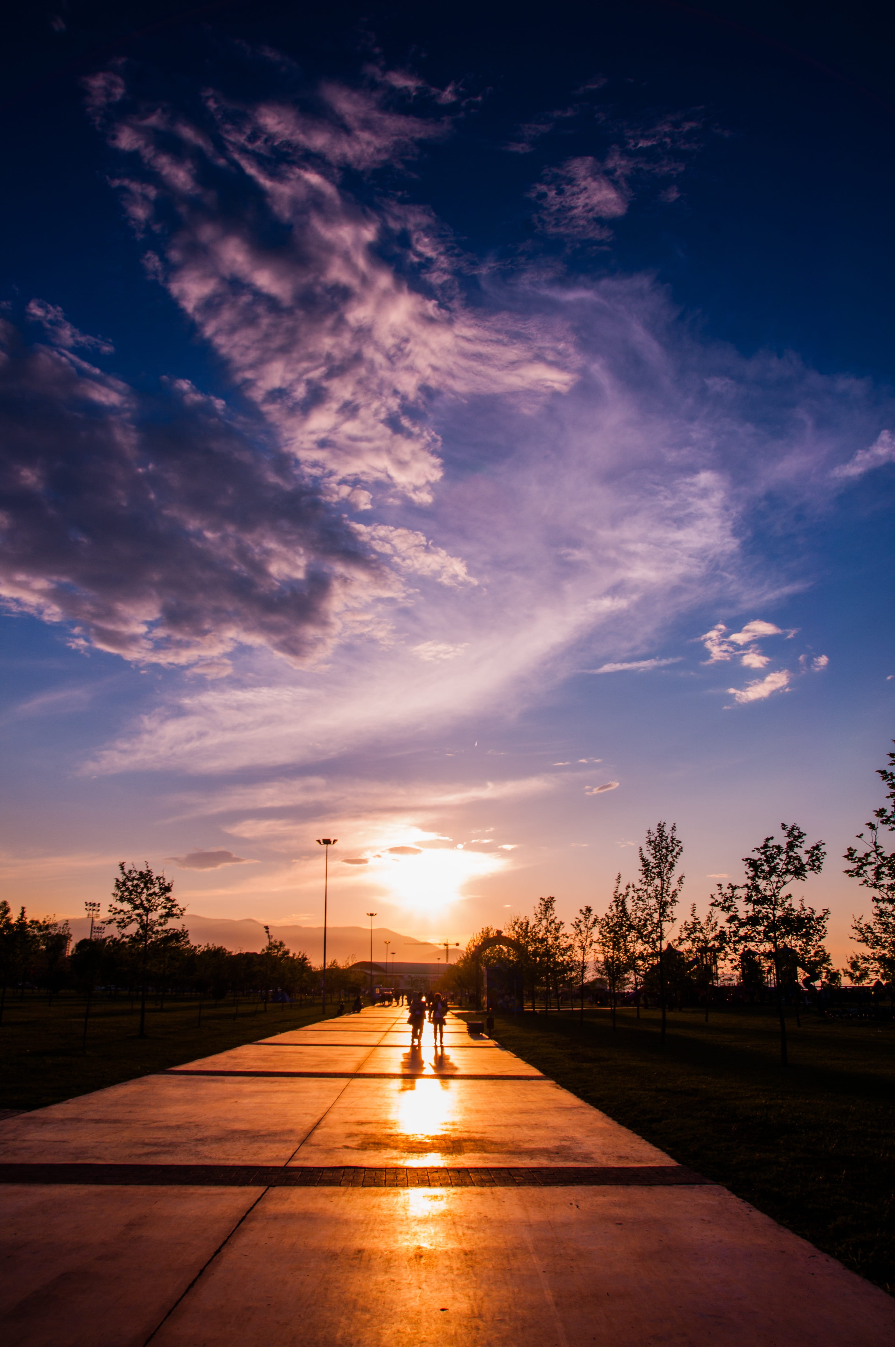 Two Person Walking on Concrete Pavement, clouds, cloudscape, dawn