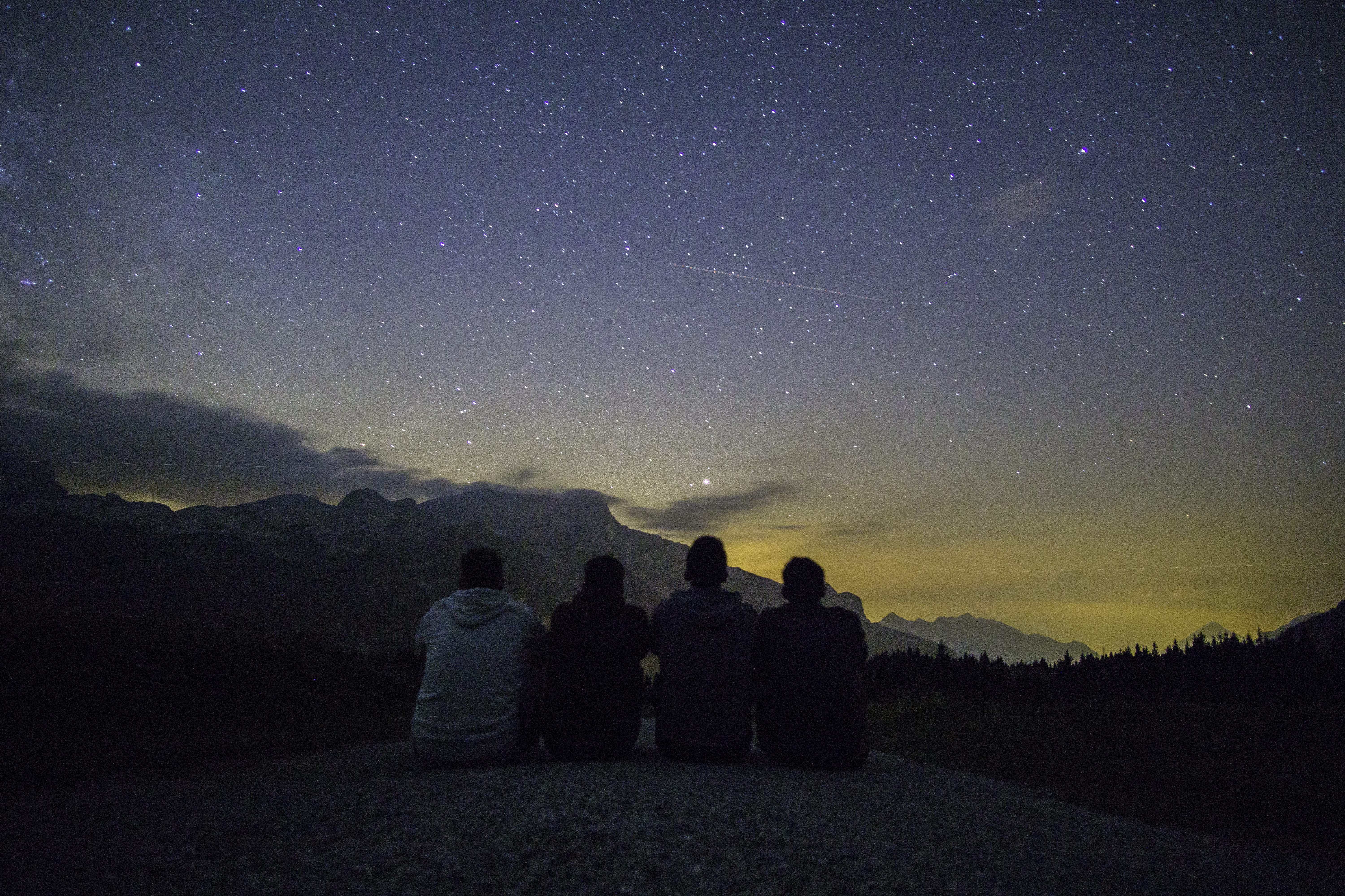 four people sitting while watching sunset, sky, star - space
