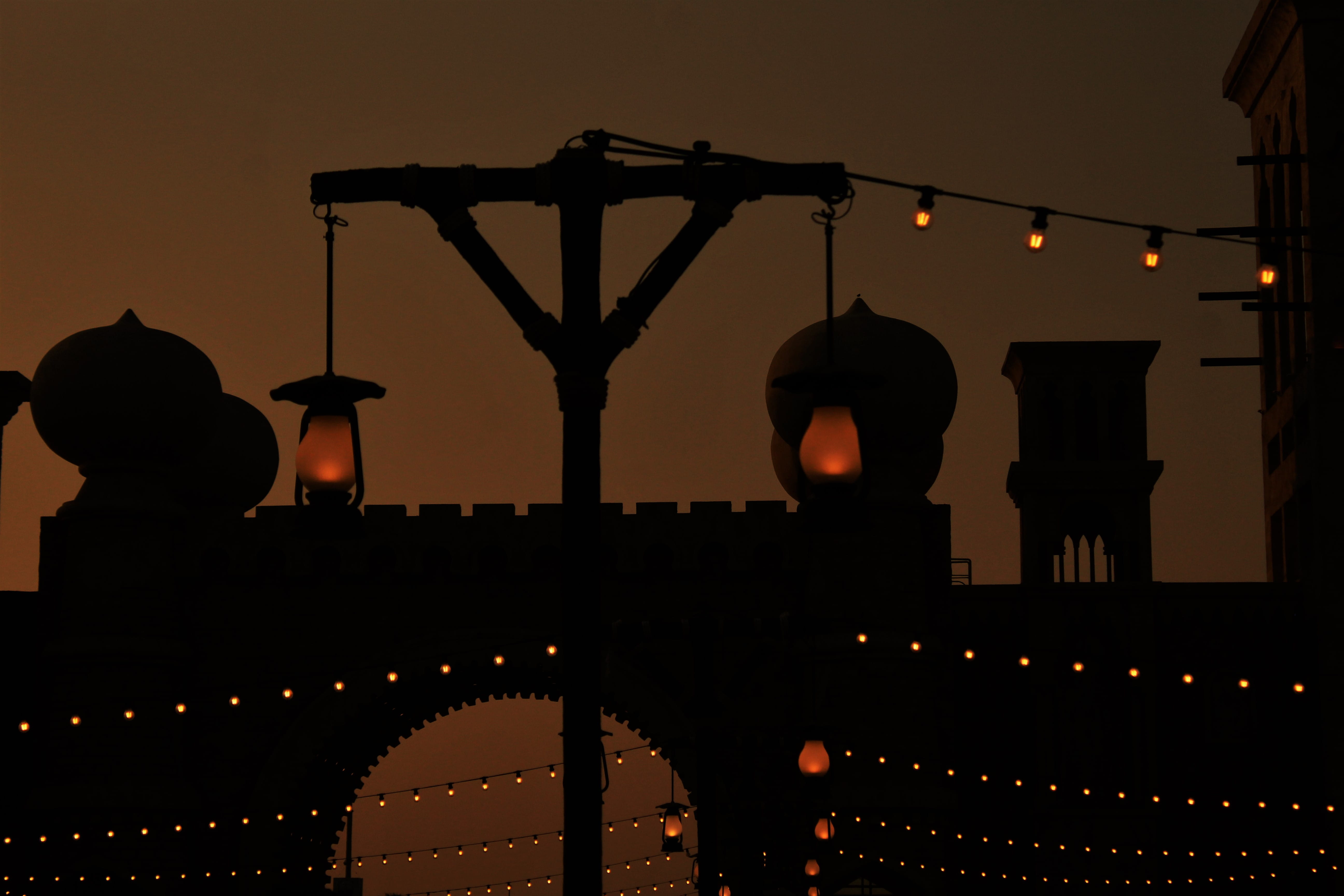silhouette, architecture, illuminated, built structure, lighting equipment