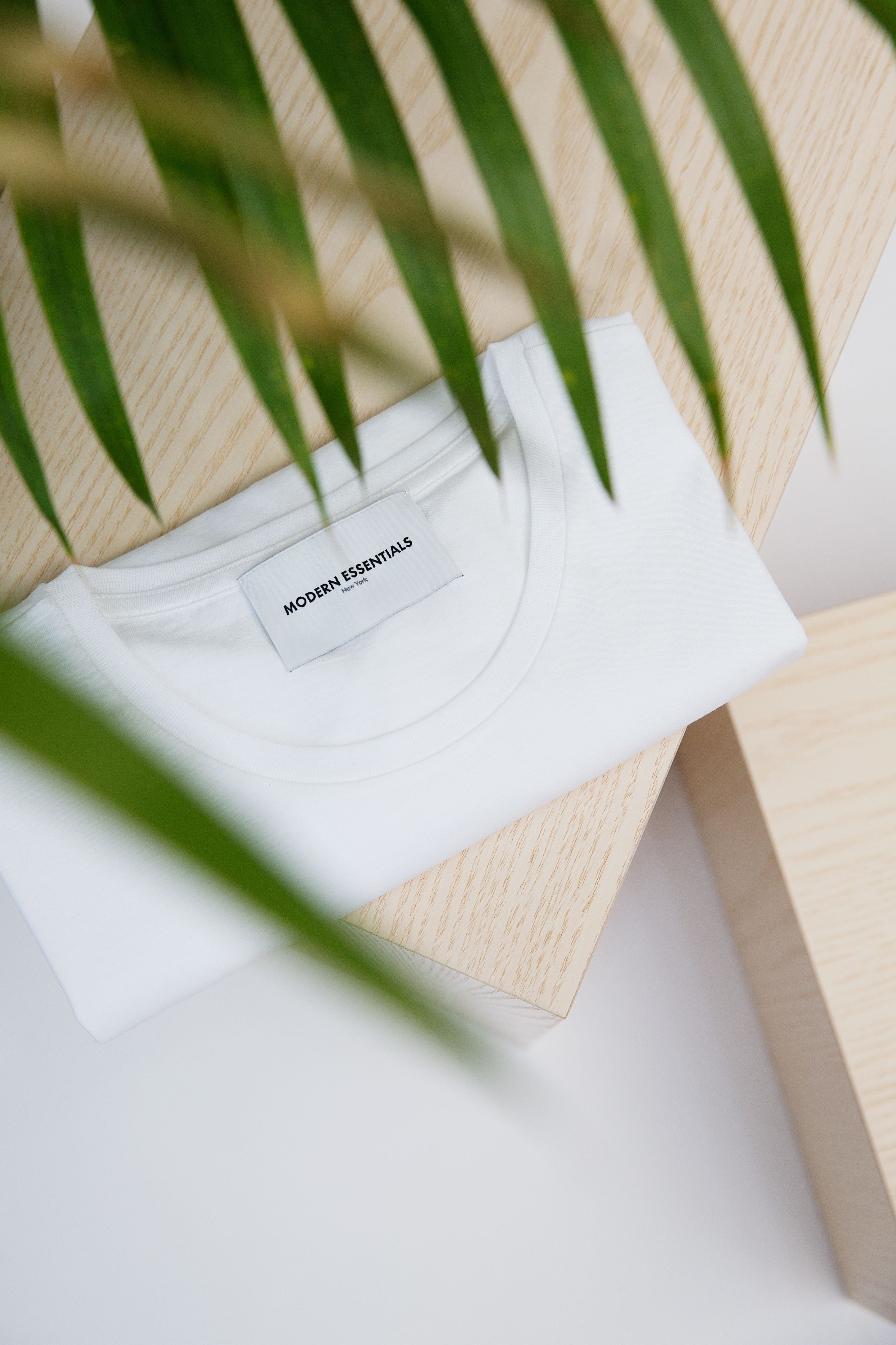 white crew-neck shirt on wooden table, united states, 14 murray street