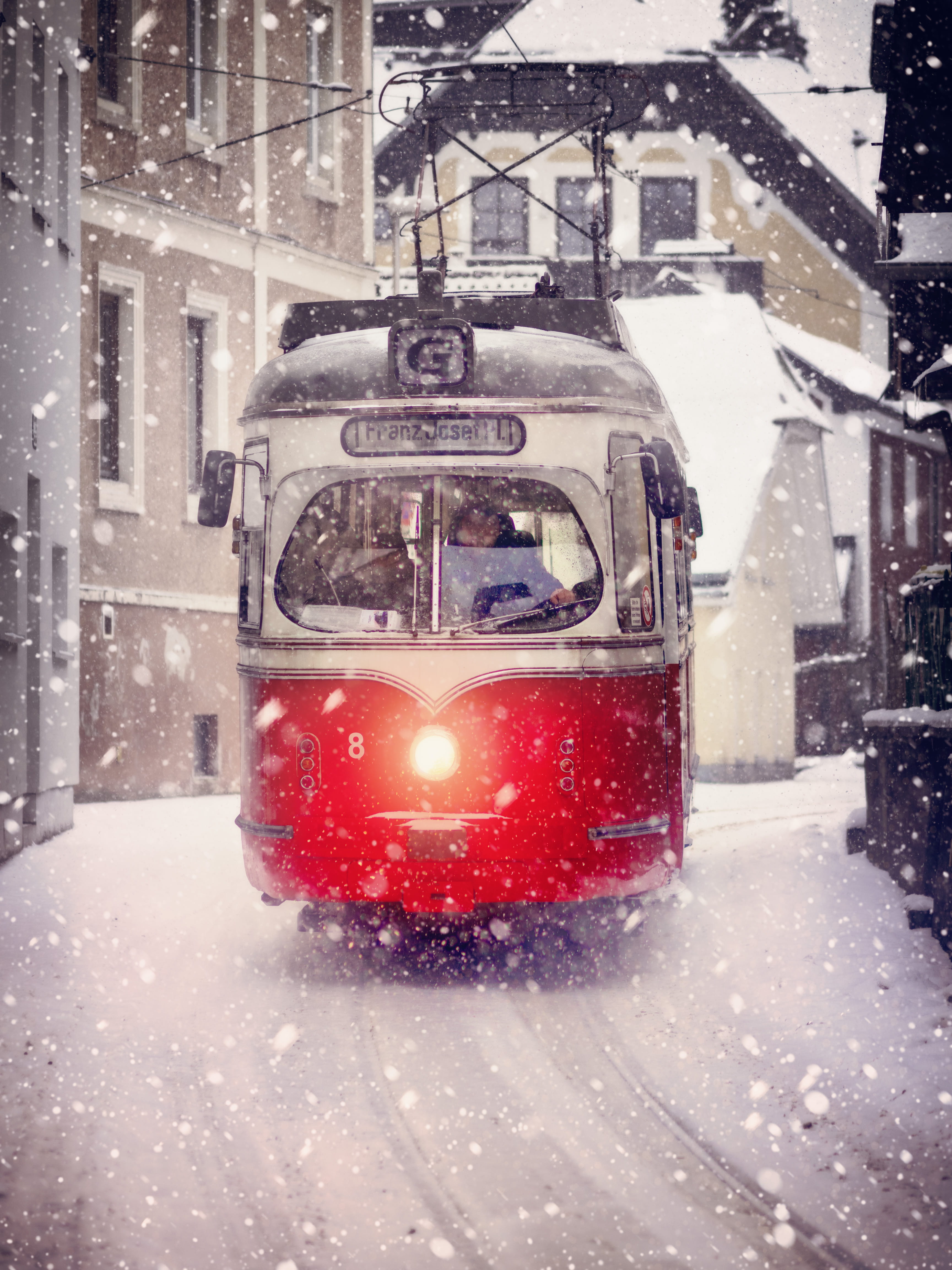 white and red cable train during winter, snow, cold temperature