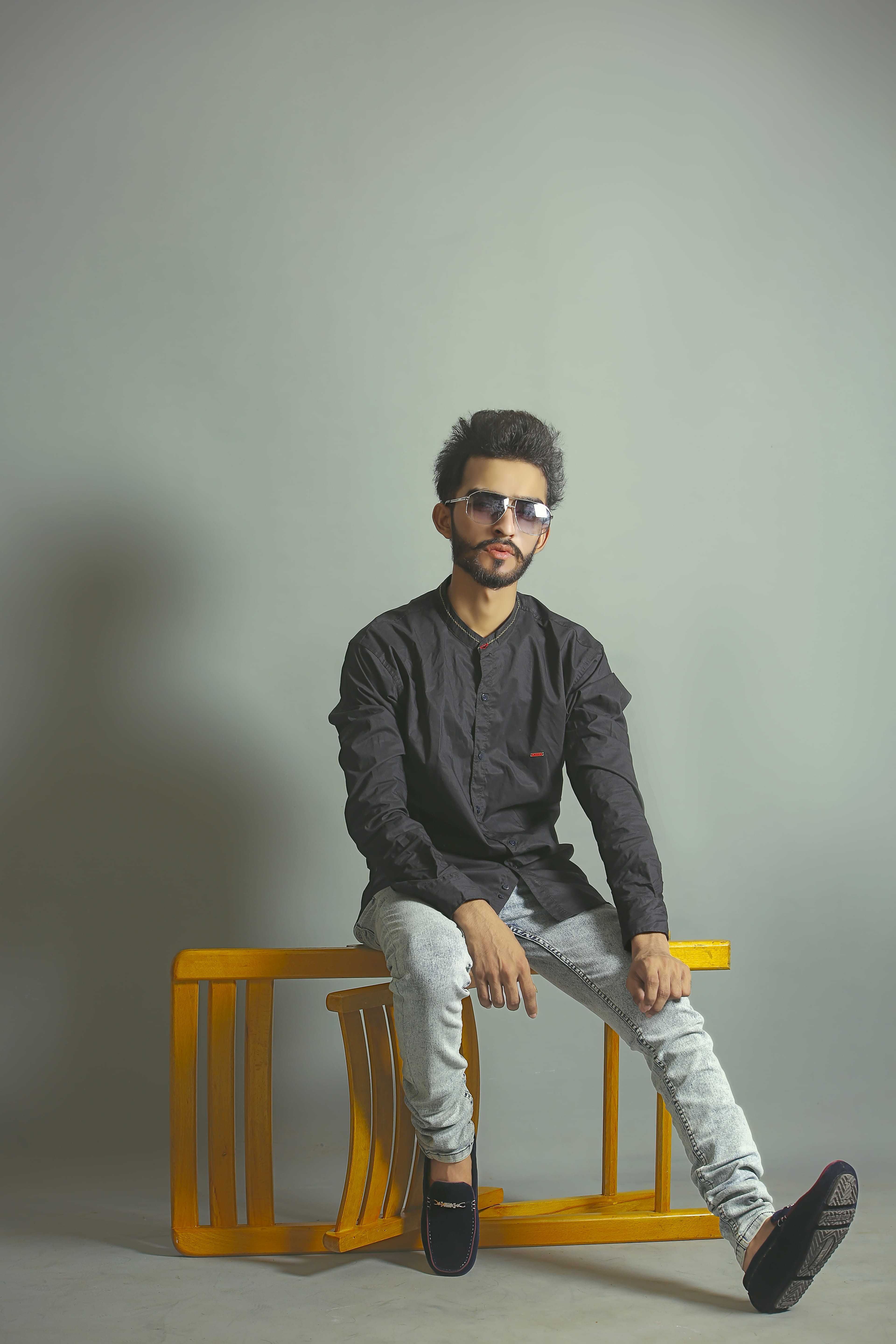 Photo of Man Sitting on Chair, photoshoot, posing, young men