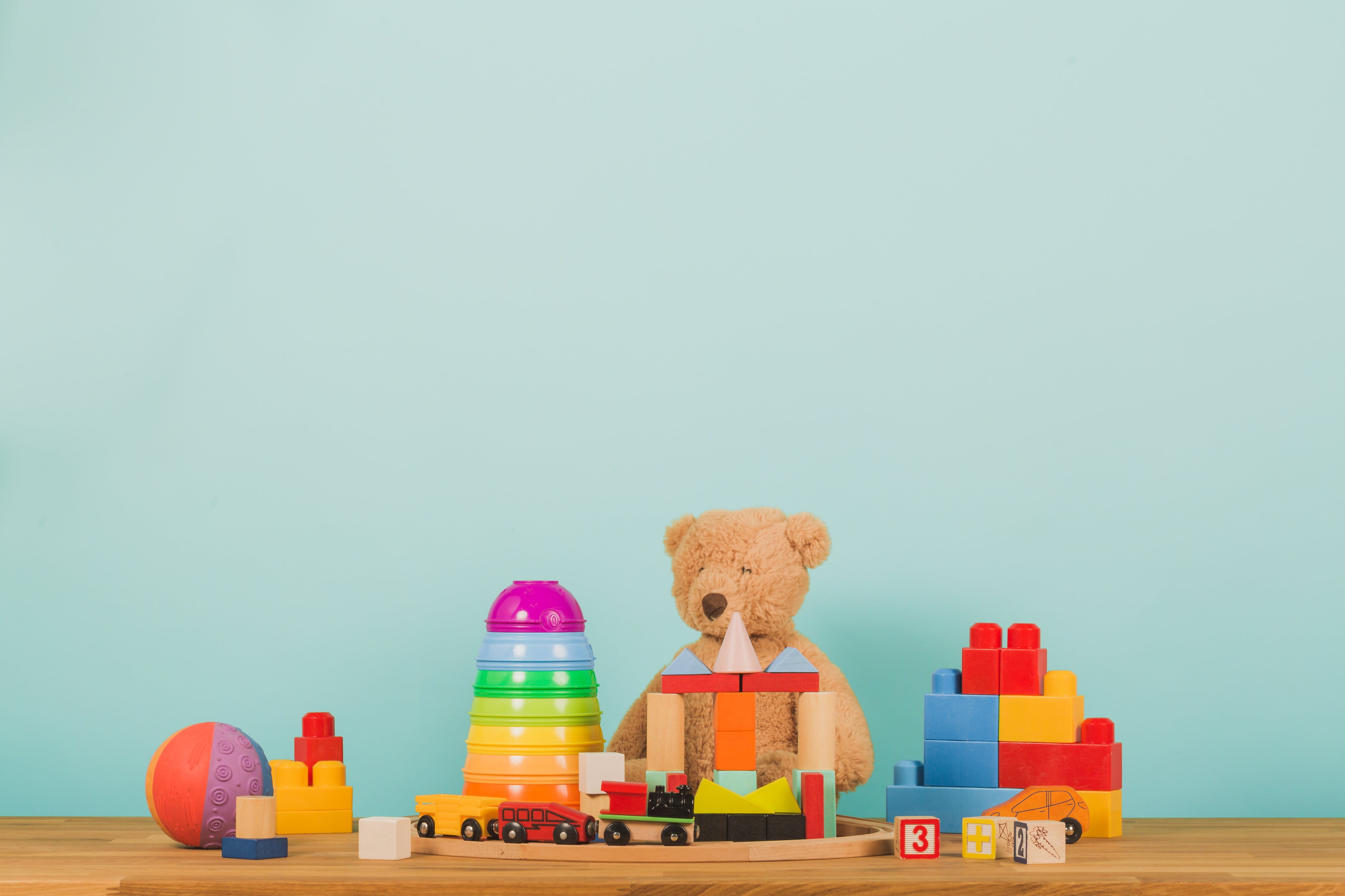 Colorful Kids Toys Photo, copy space, colored background, no people