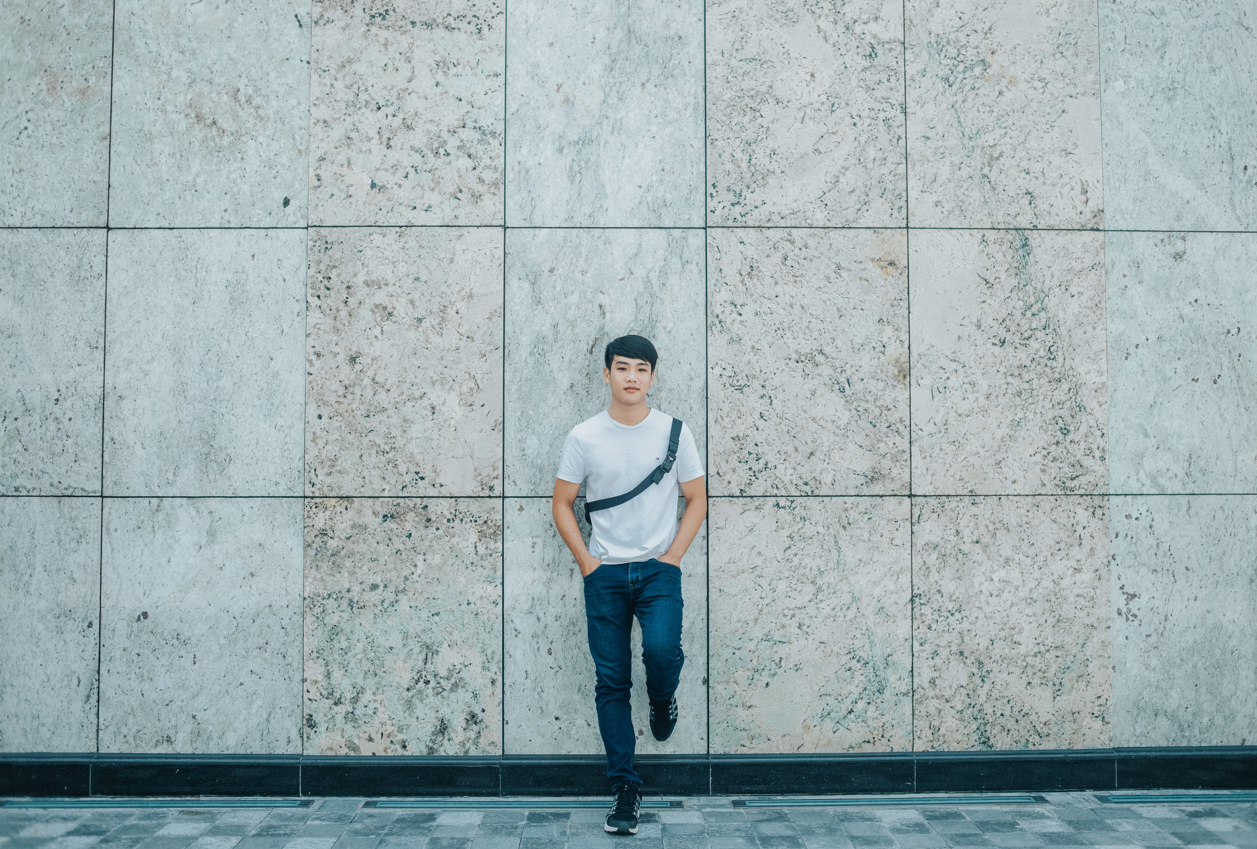 Man Standing Behind Concrete Establishment, architecture, boy