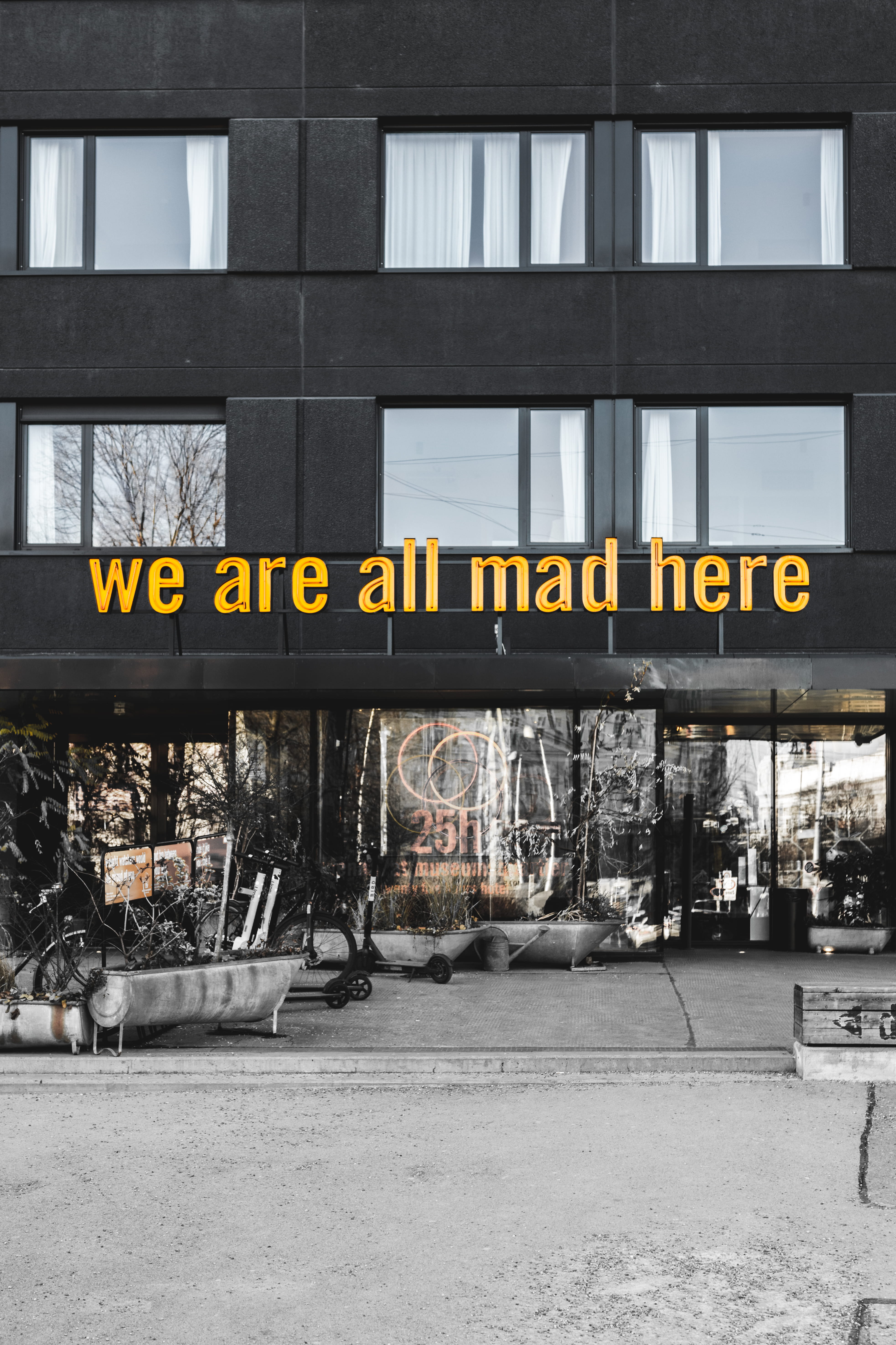 concrete building, architecture, text, communication, transportation