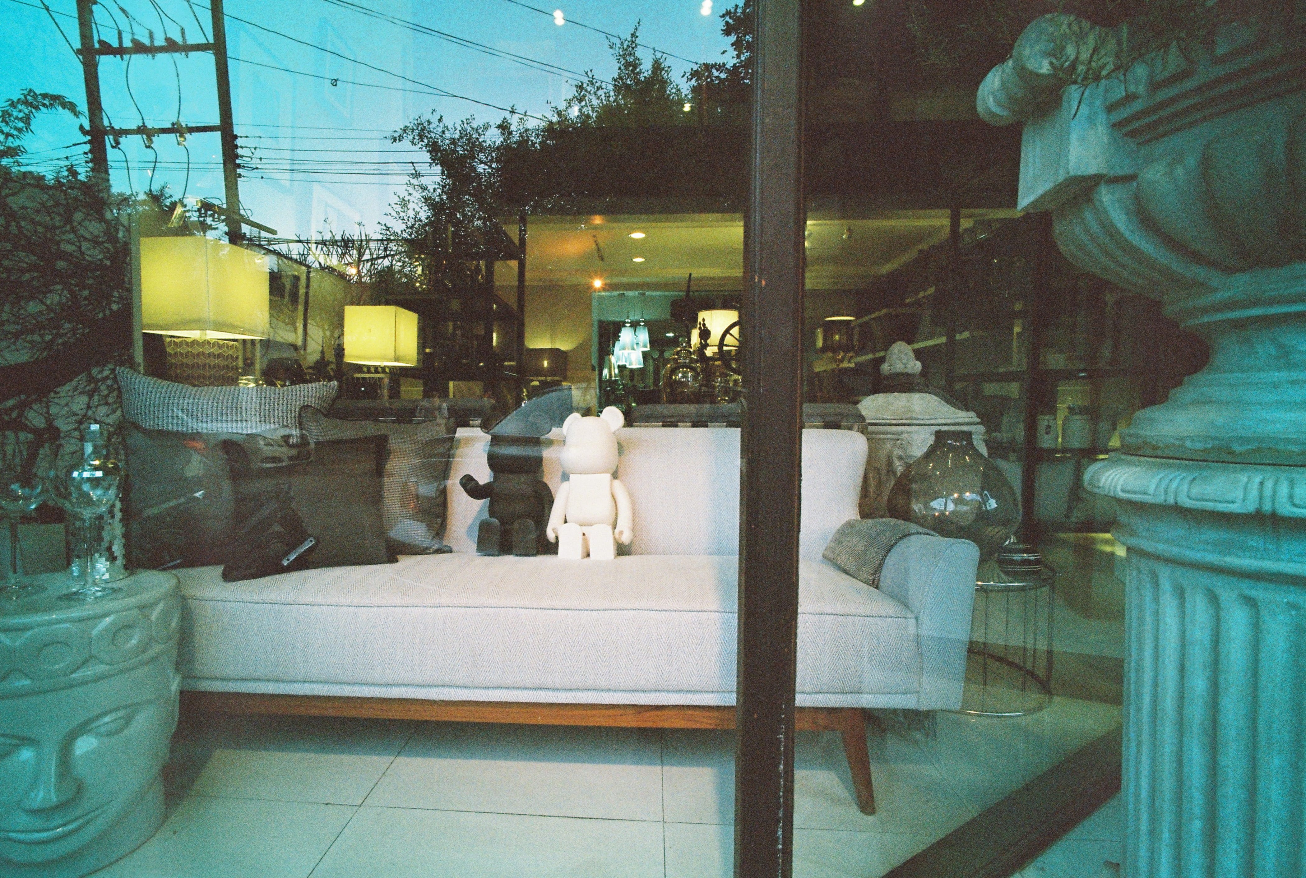cuddle, statue, bear, store, store front, reflection, sofa