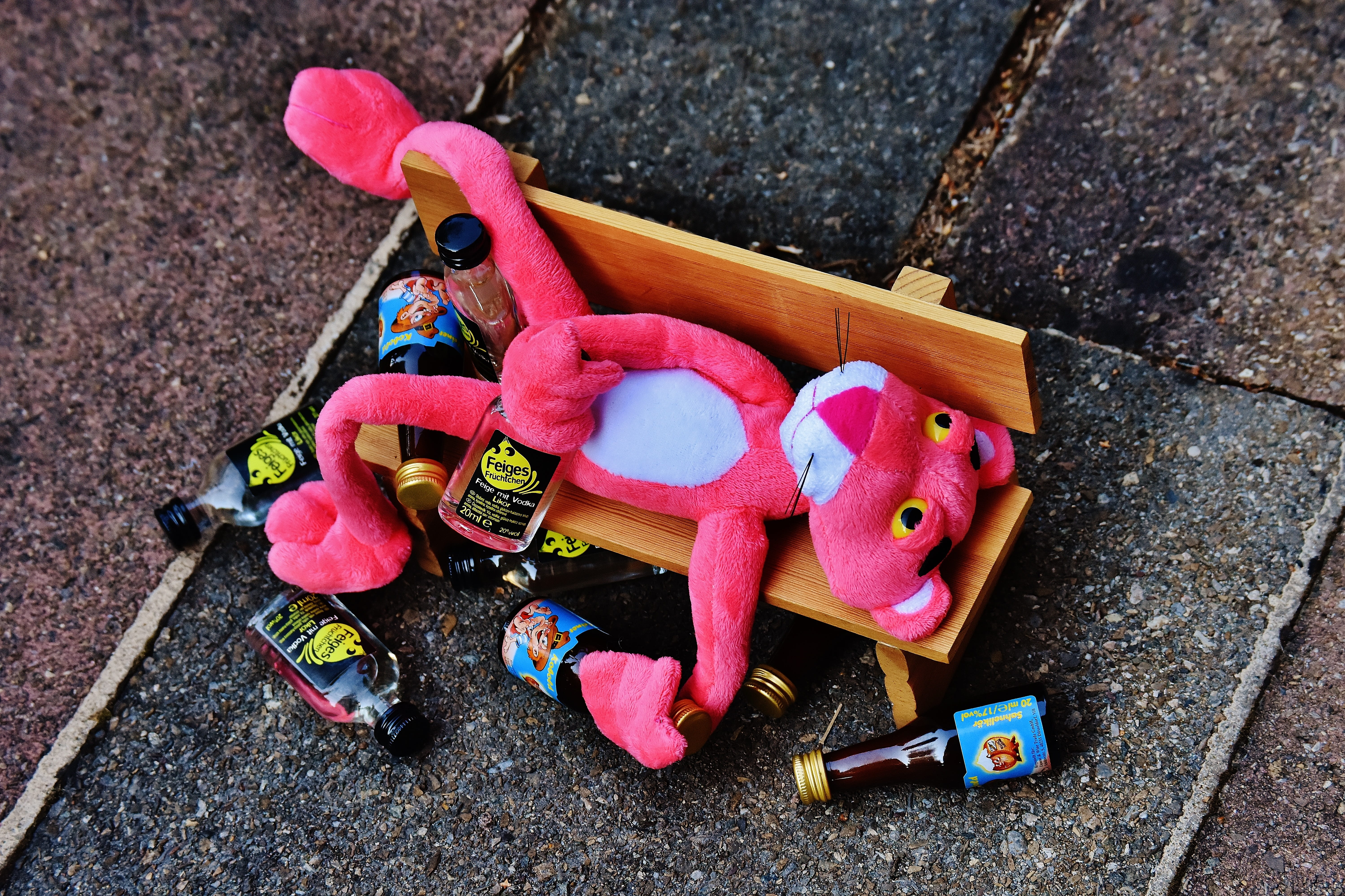 Pink Panther Plush Toy on Brown Bench Miniature, alcohol, art