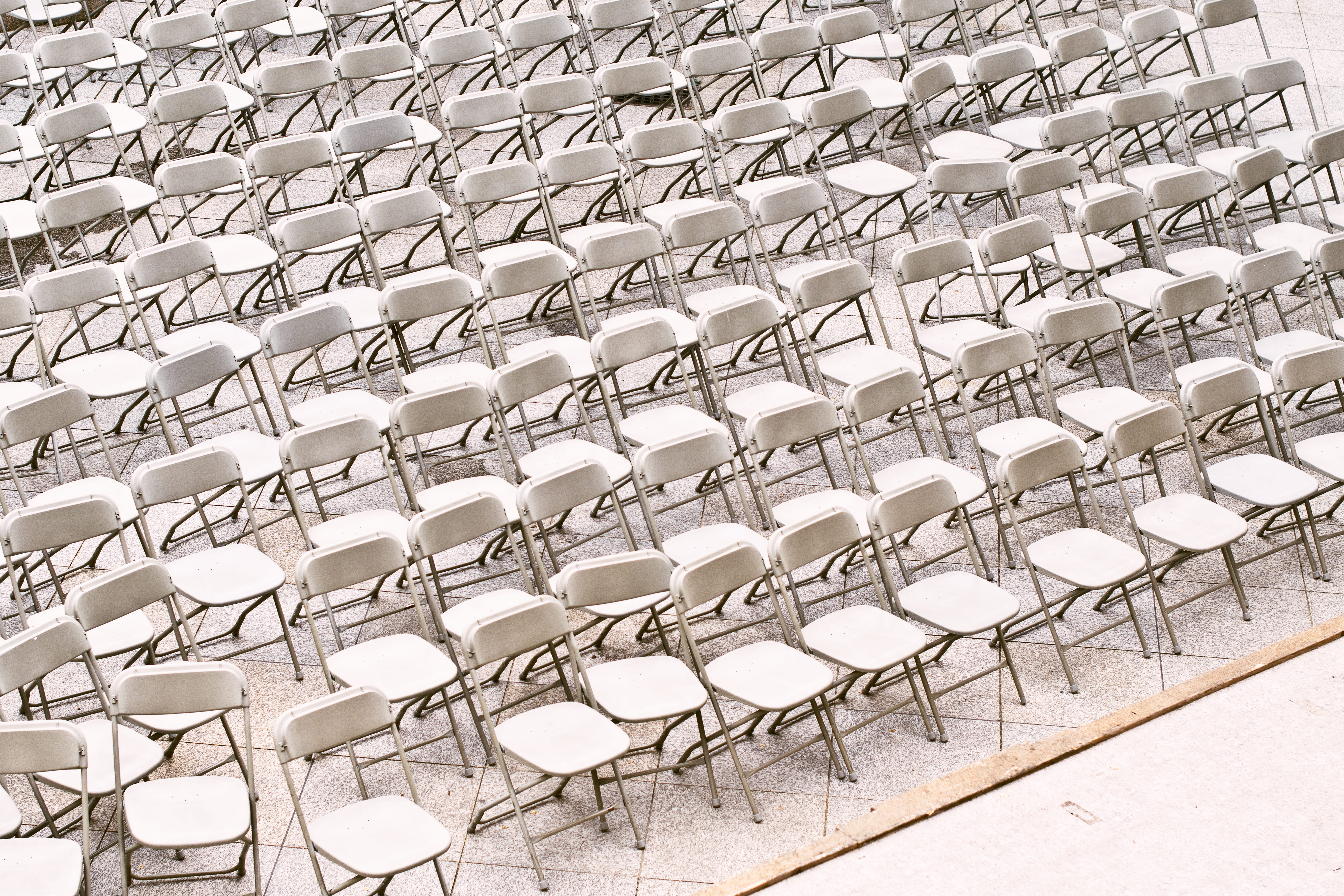 white folding chairs, in a row, seat, arrangement, absence, empty