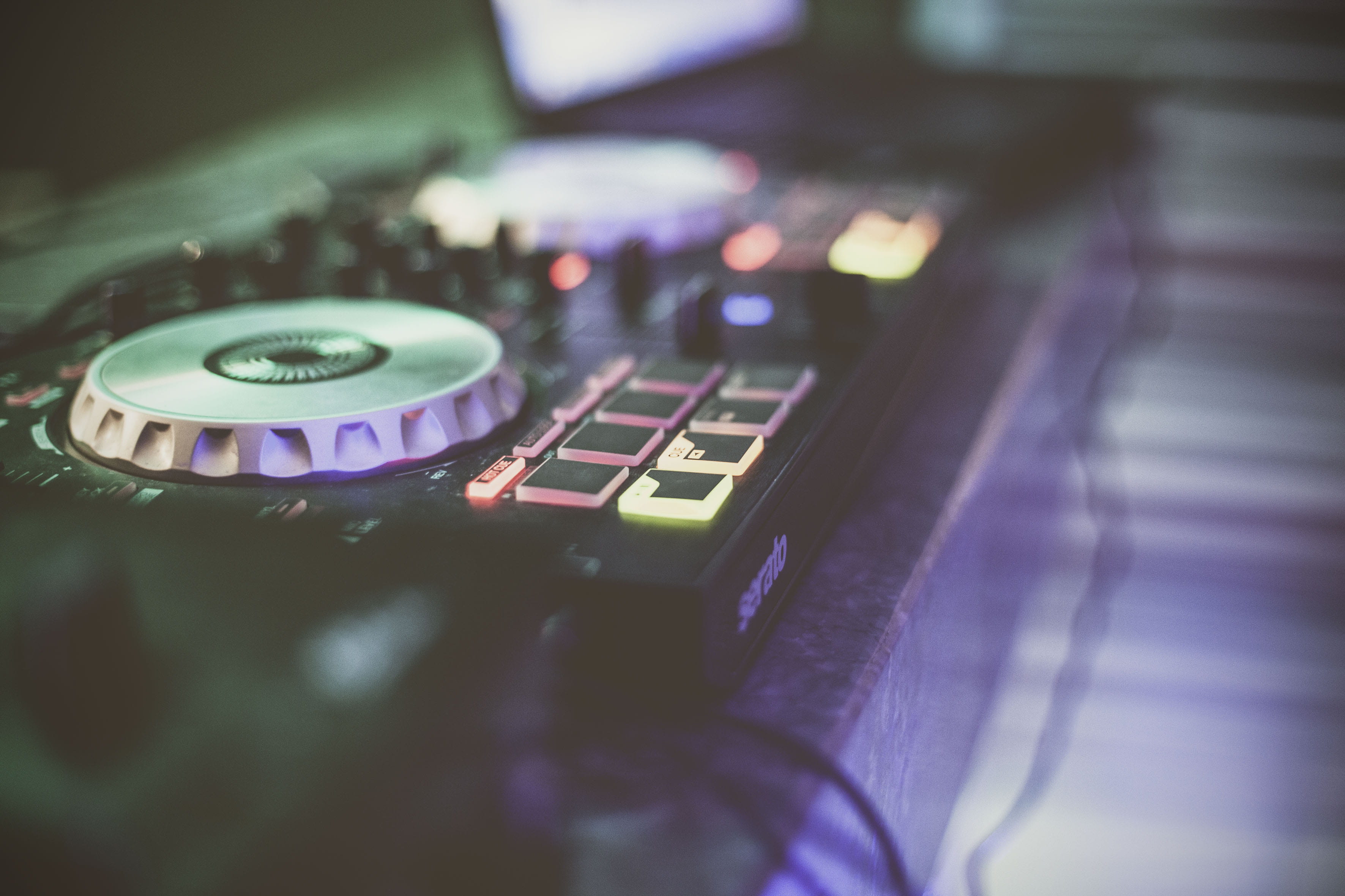 black DJ controller, technology, indoors, selective focus, close-up