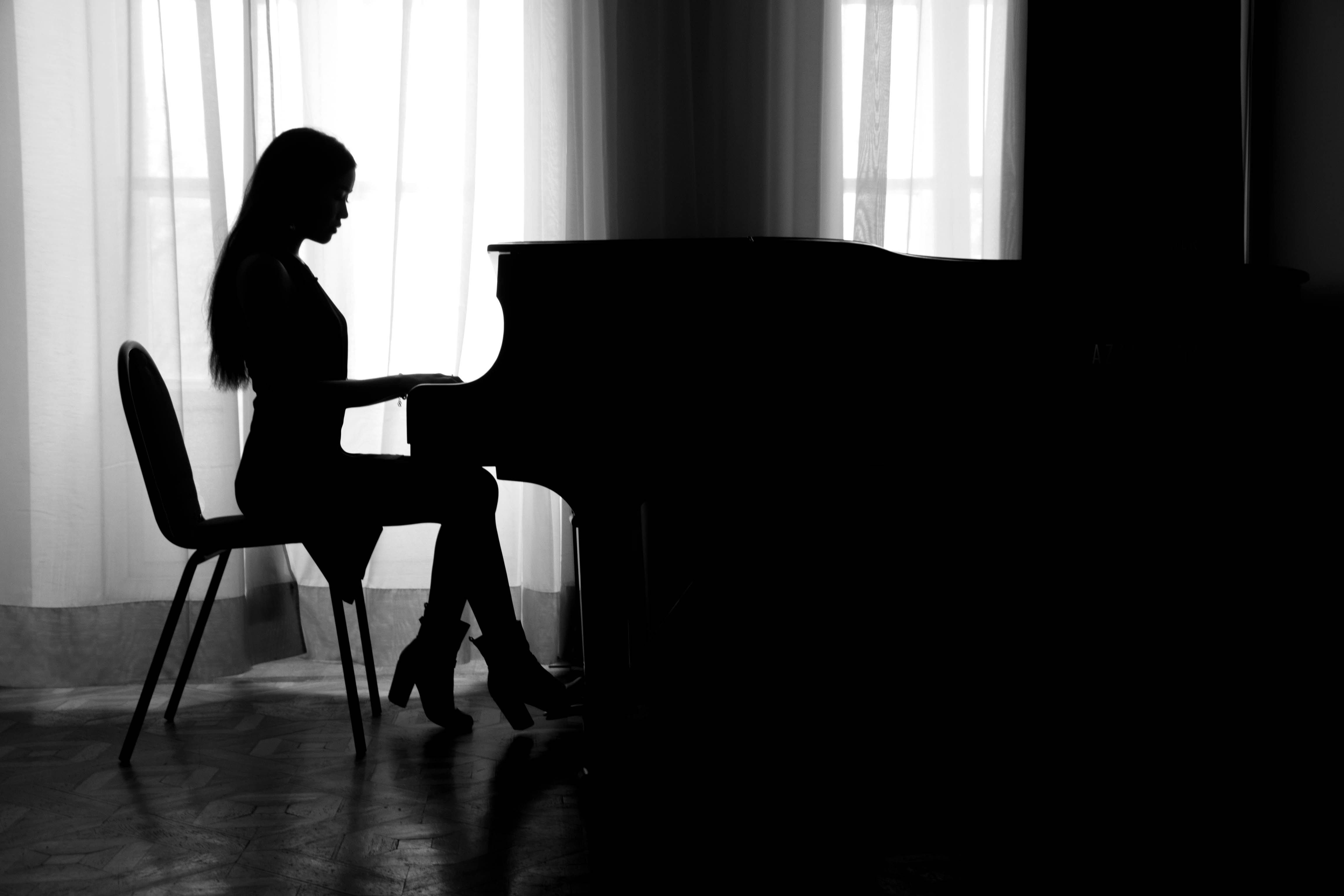 silhouette of woman playing piano, one person, musical equipment