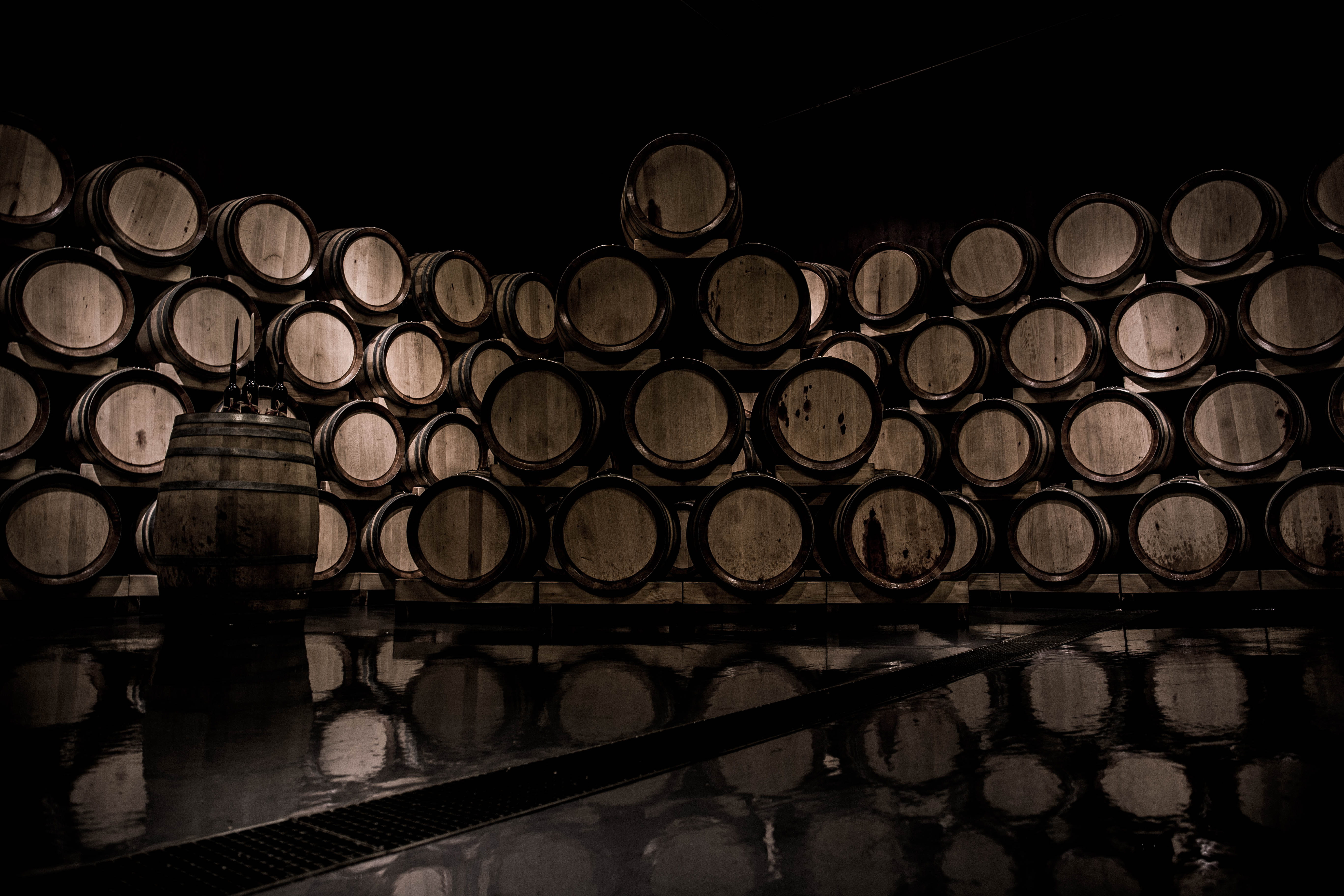 brown wooden wine barrel lot, switzerland, weinkellerei riem