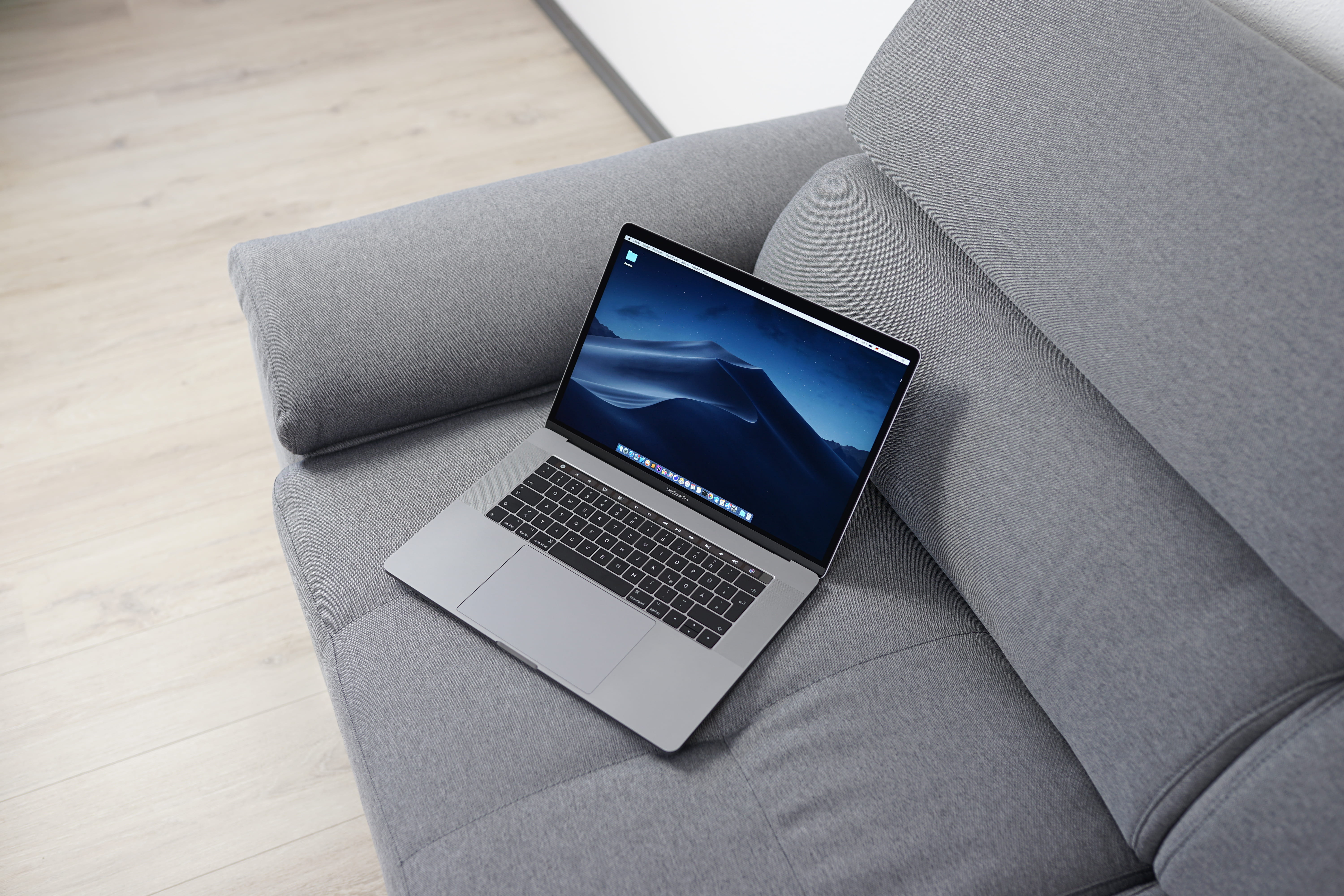MacBook Pro on gray sofa, technology, computer, laptop, connection