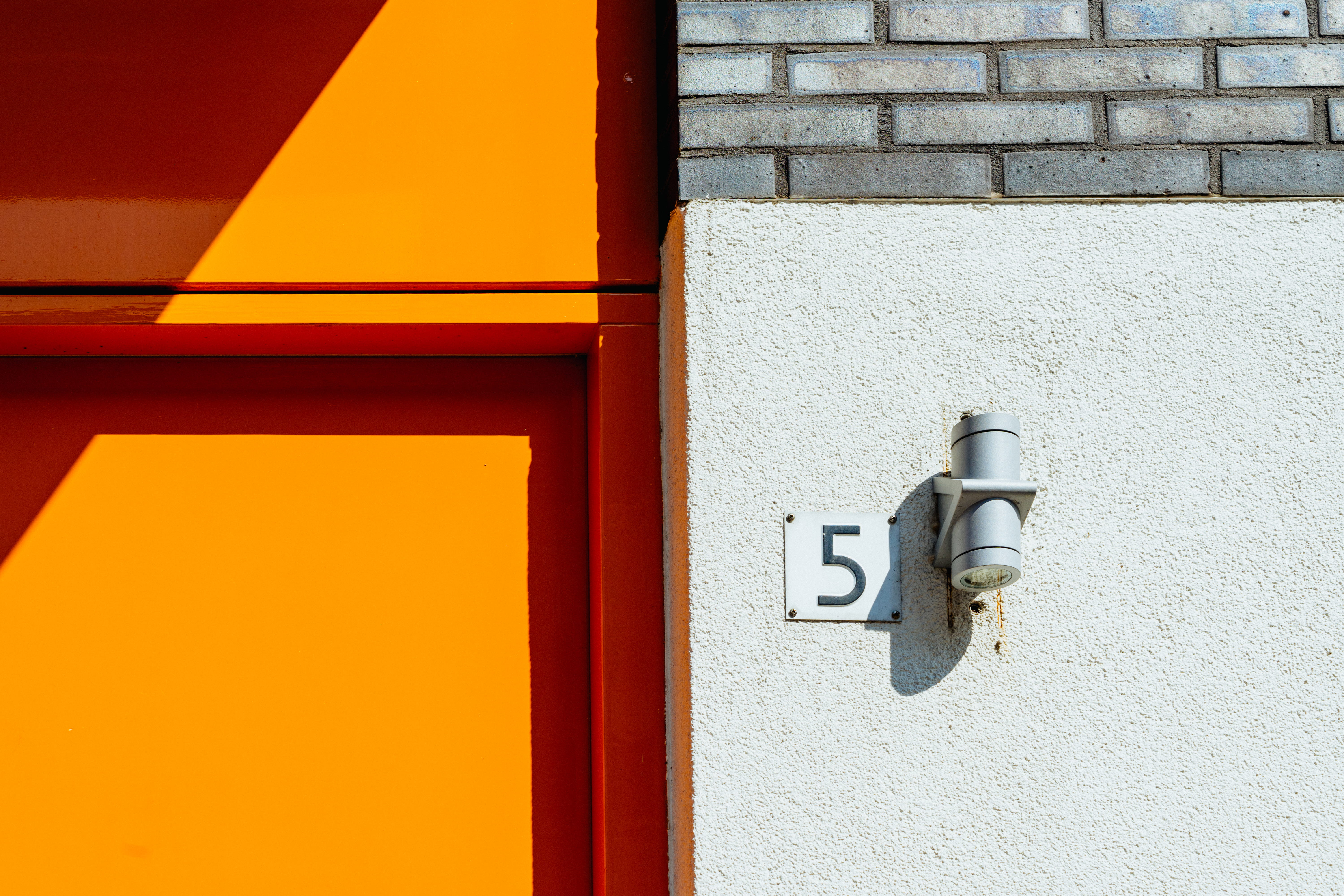 5 signage on white wall, wall - building feature, built structure