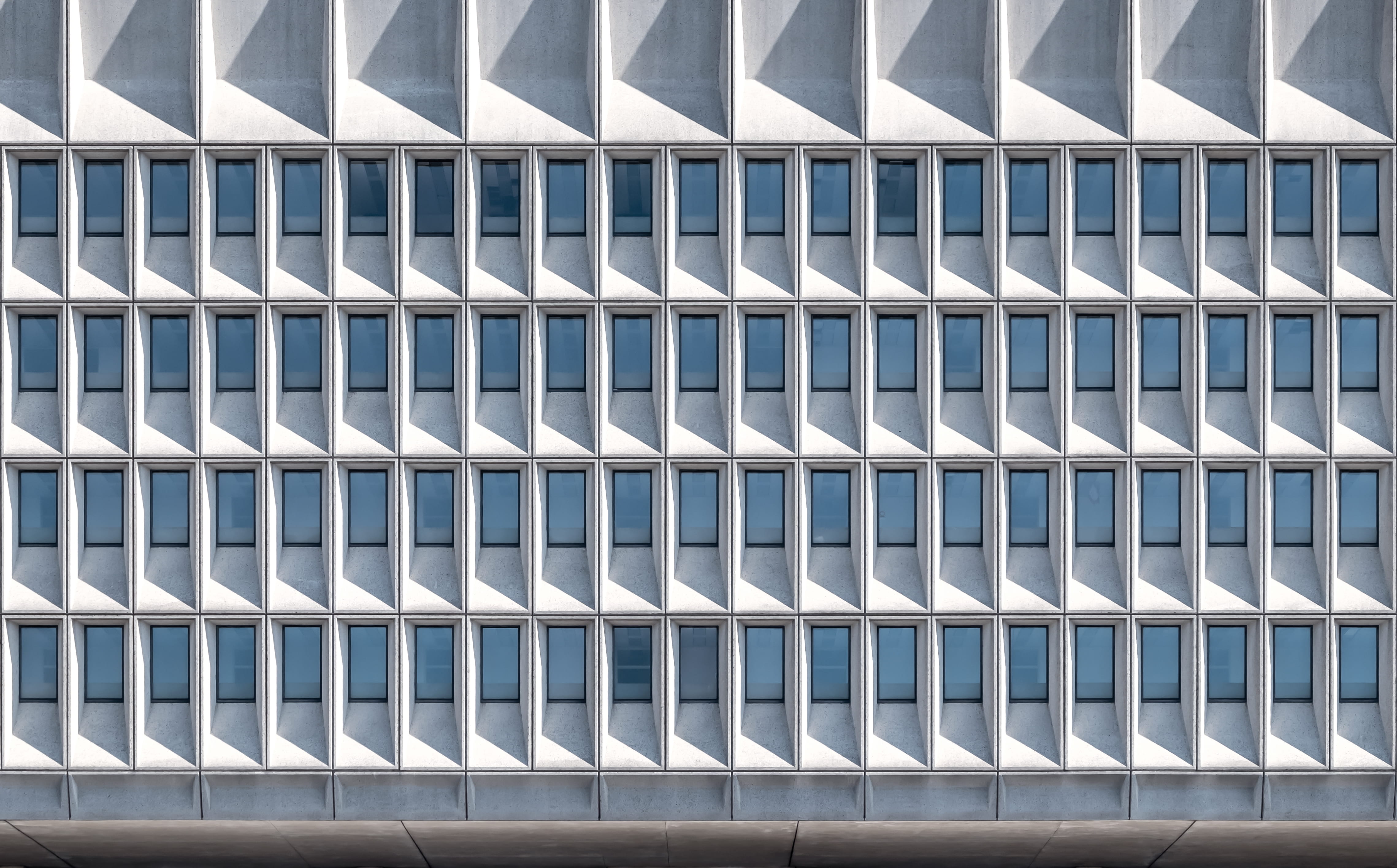 white building during daytime, full frame, pattern, backgrounds