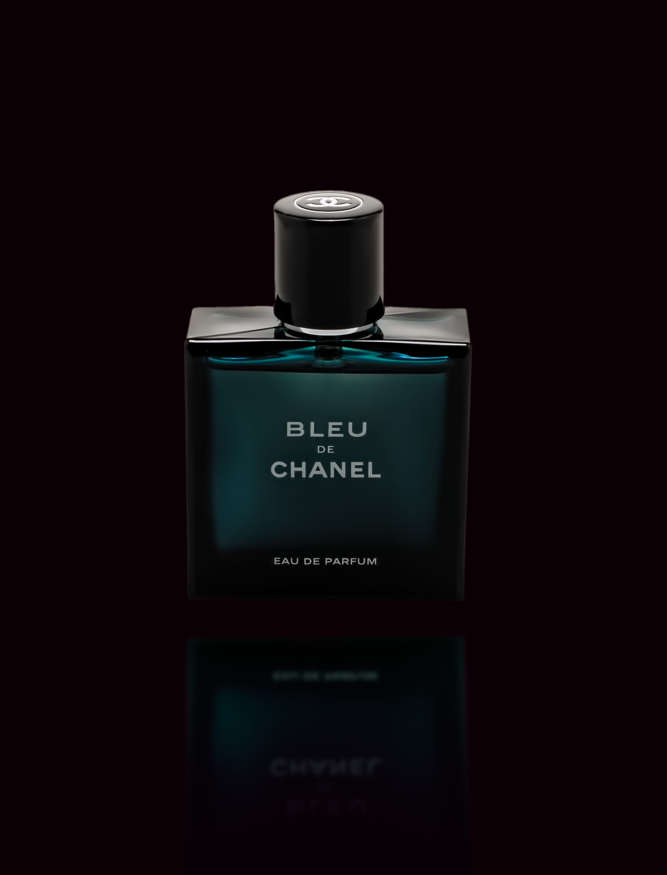Bleu de Chanel eau de parfum bottle, indoors, studio shot, close-up