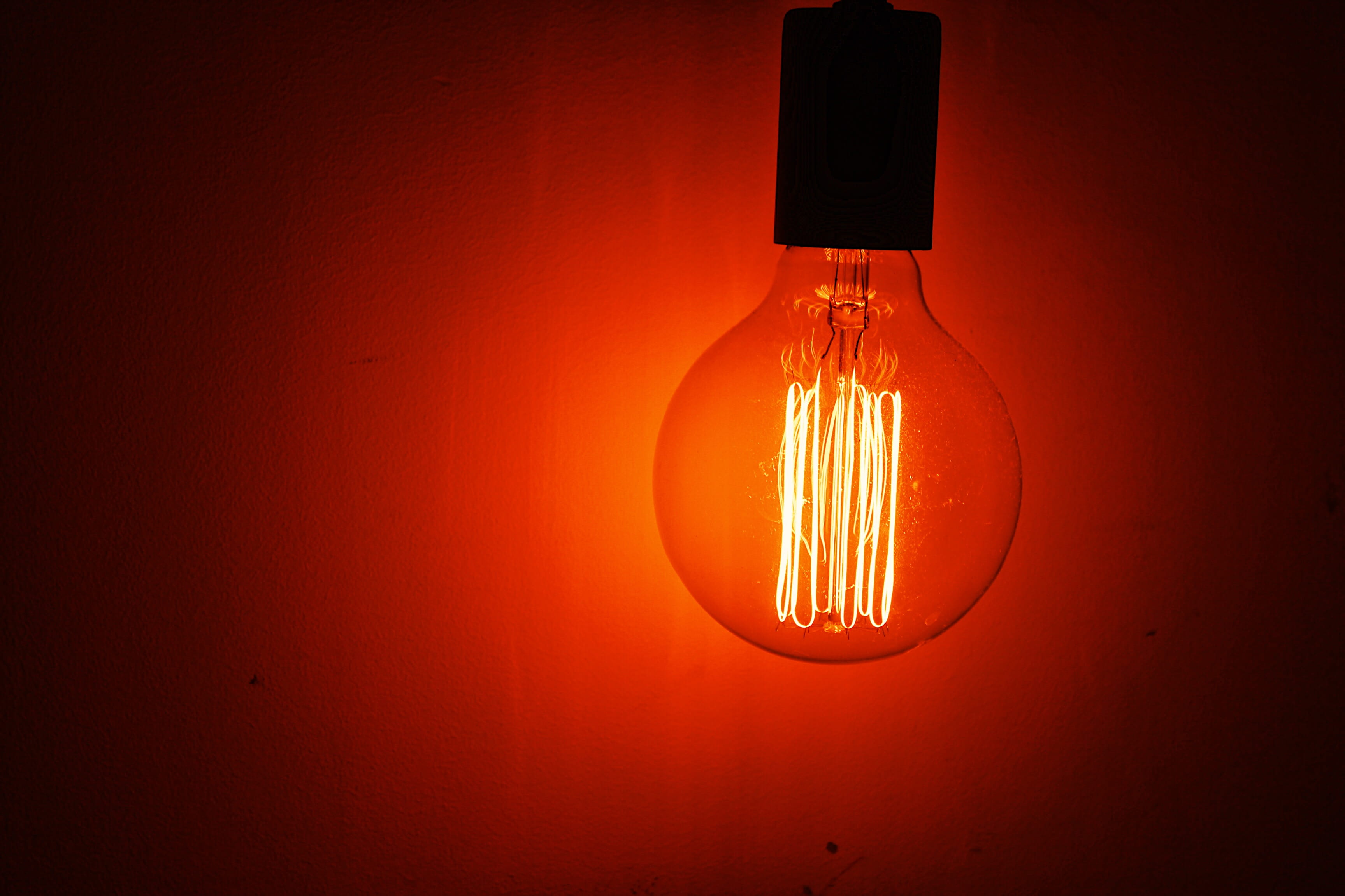 lighted incandescent bulb, lightbulb, red, lamp, lampshade, lighting