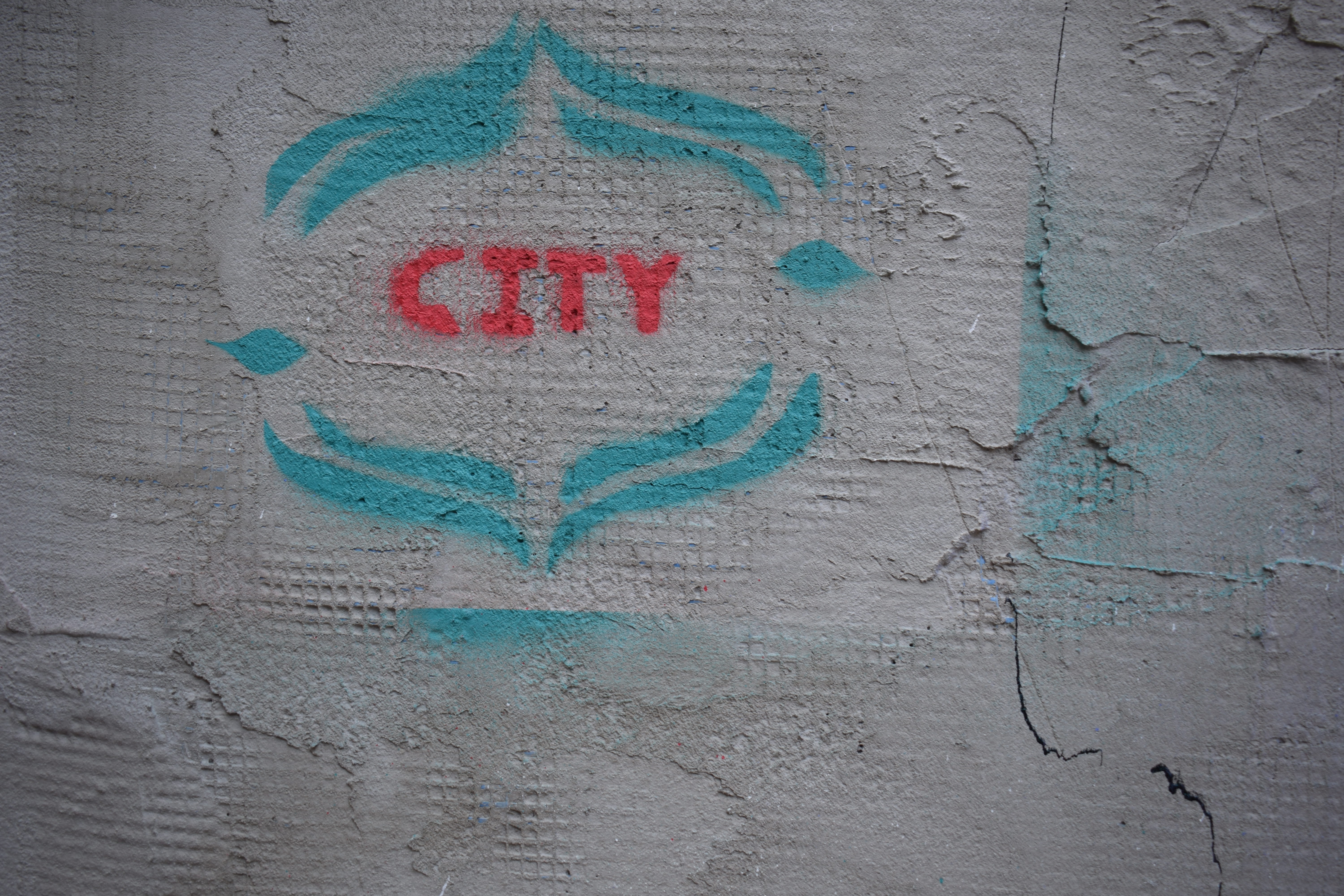 white printer paper, wall, graffiti, rug, home decor, text, stain