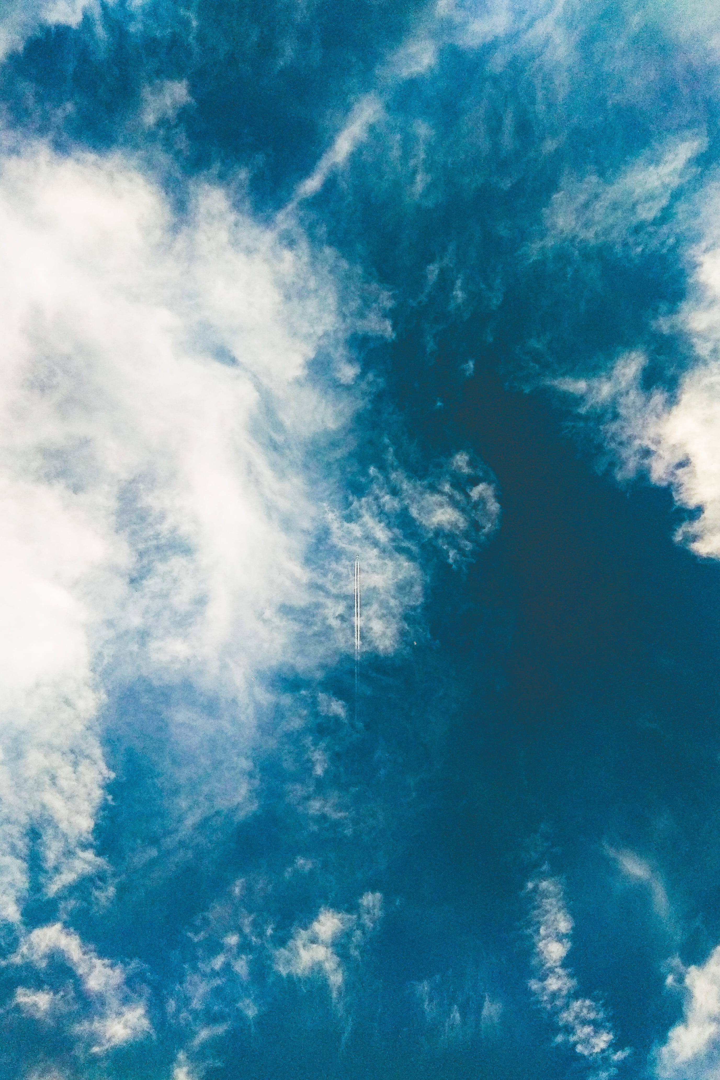 blue, sky, mid day, bright, clouds, plane, minimalist, negative space