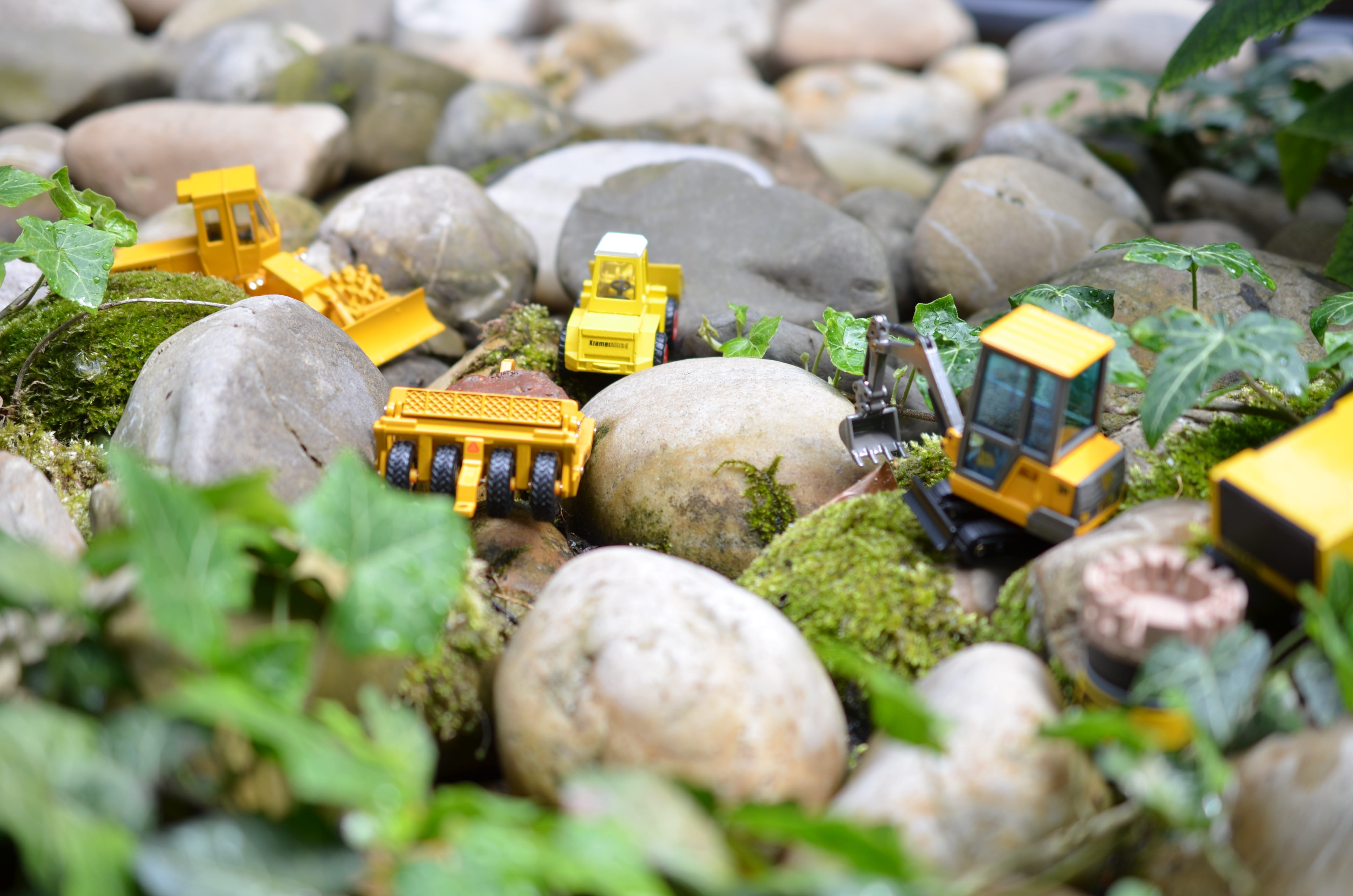 construction machinery, miniatures, selective focus, solid
