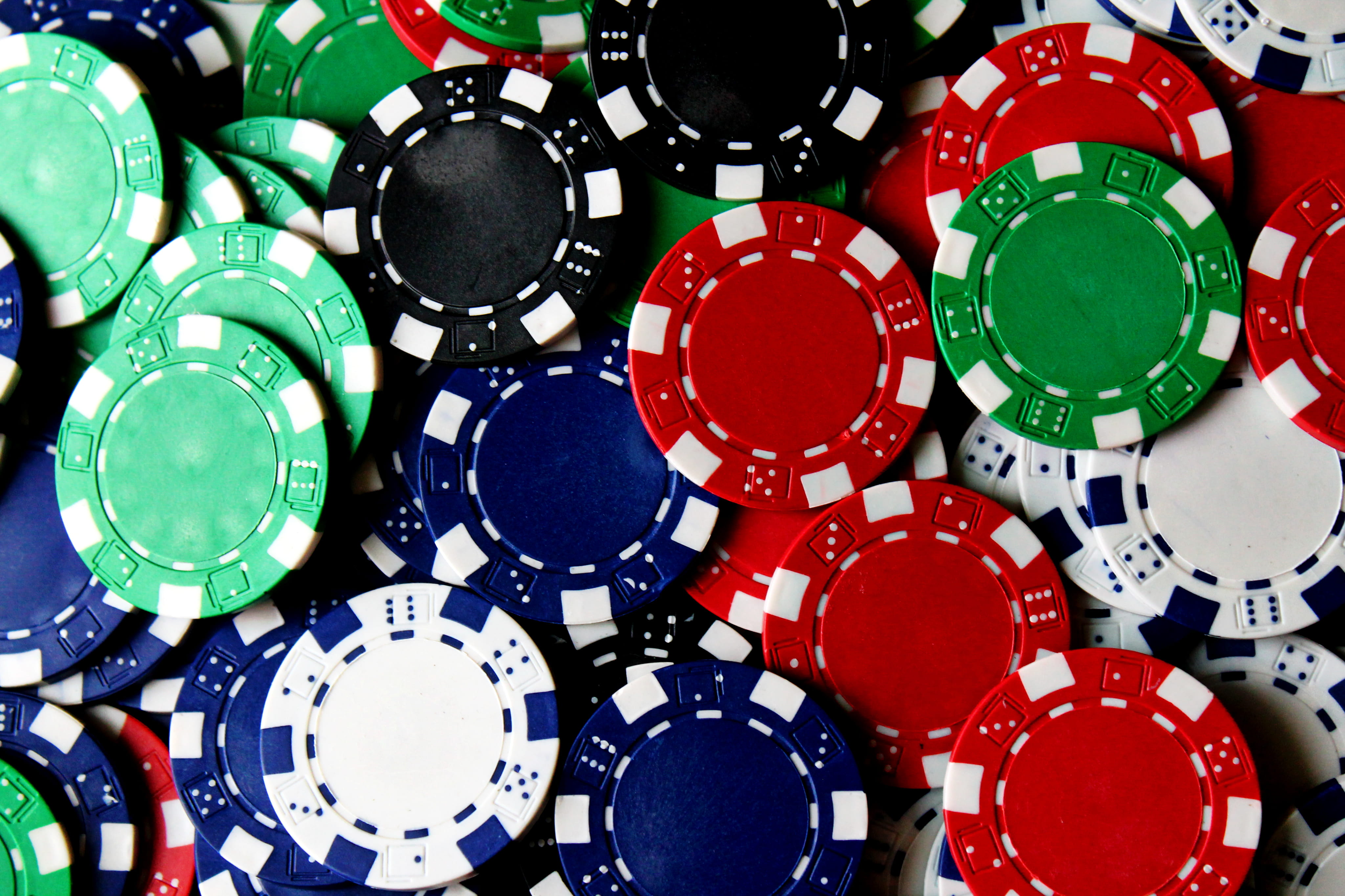 scattered poker chips, gambling, game, money, wristwatch, tower