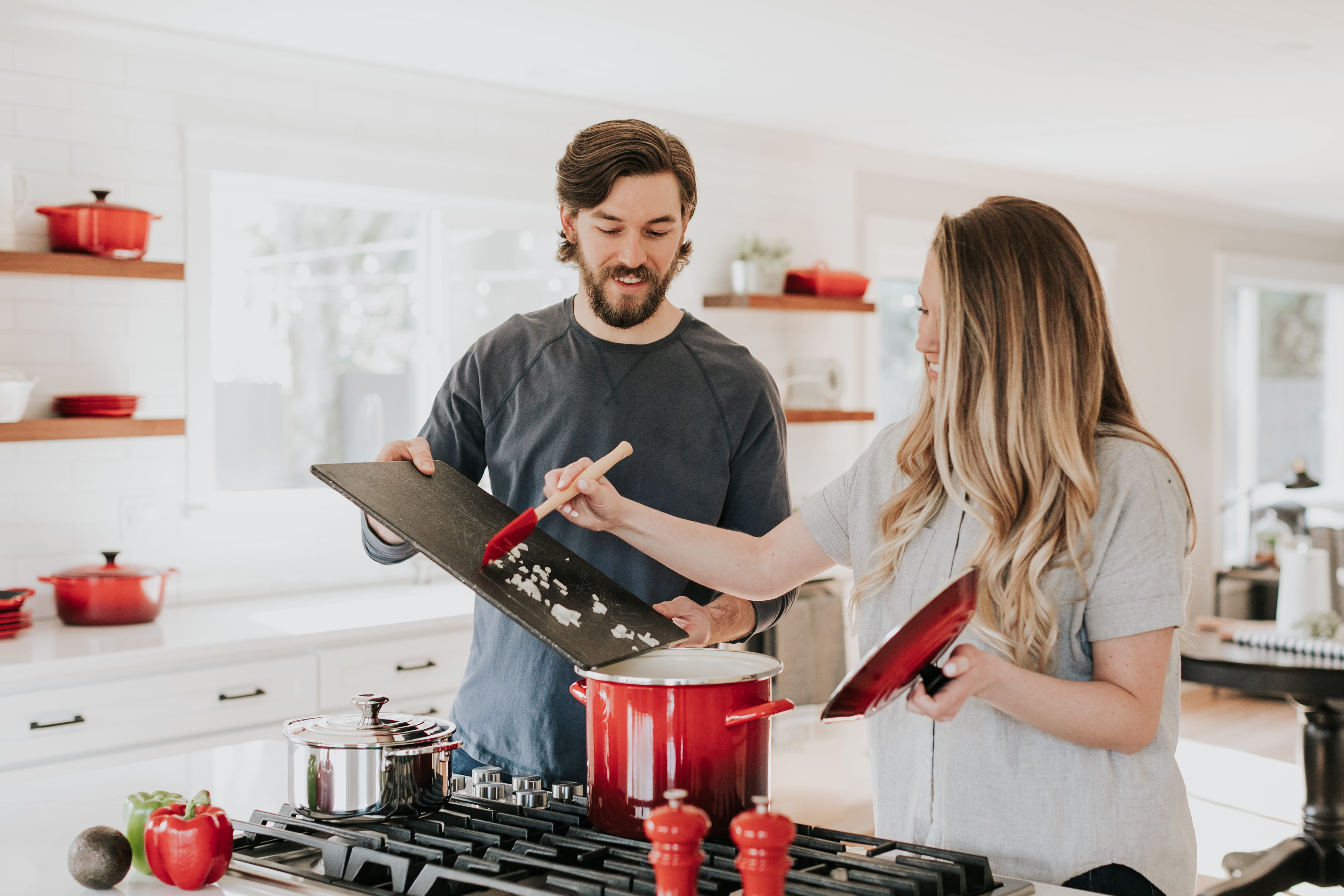 human, person, stove, cook, le creuset, chop, appliance, oven