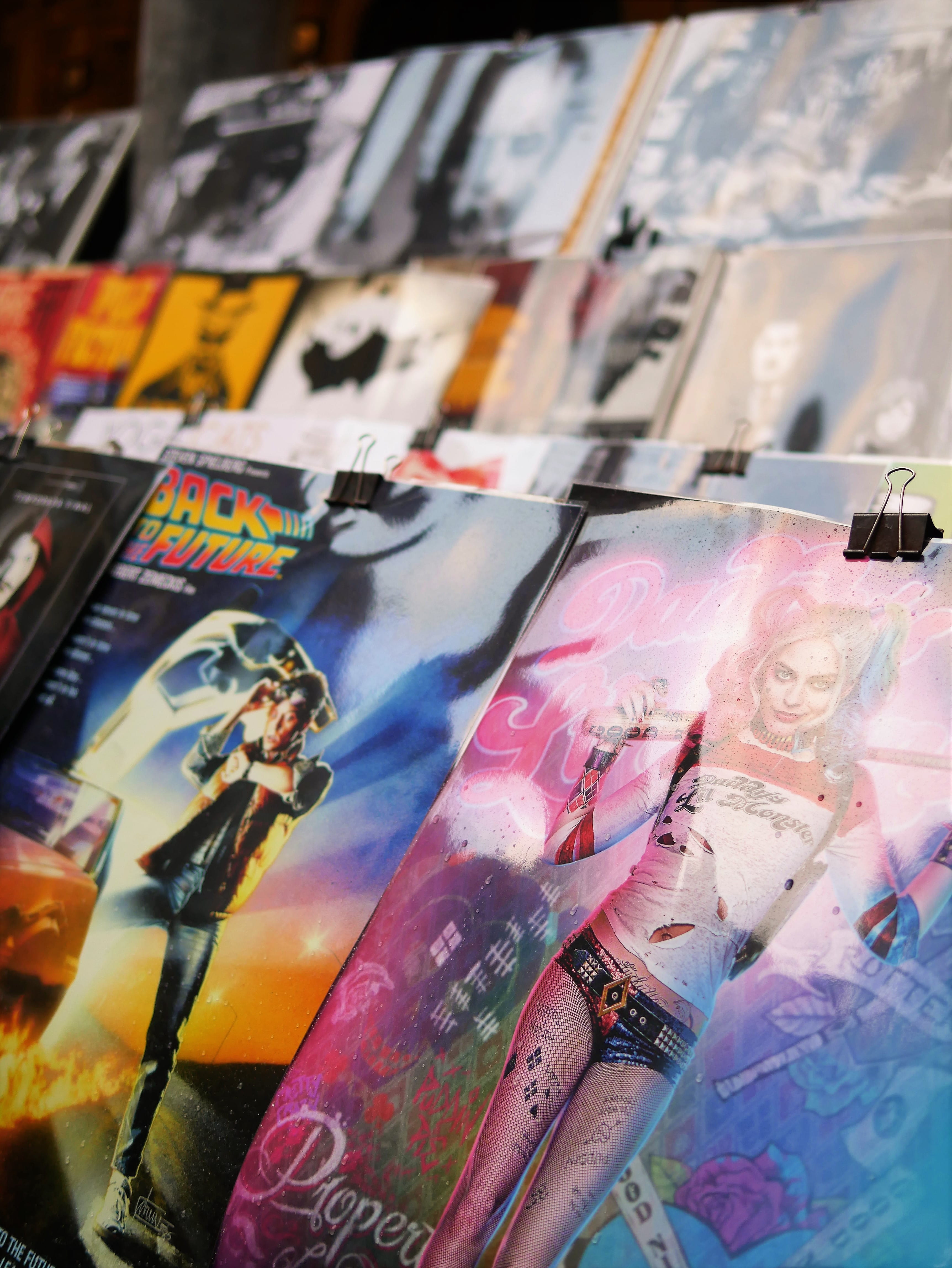 comic book collection, multi colored, no people, human representation