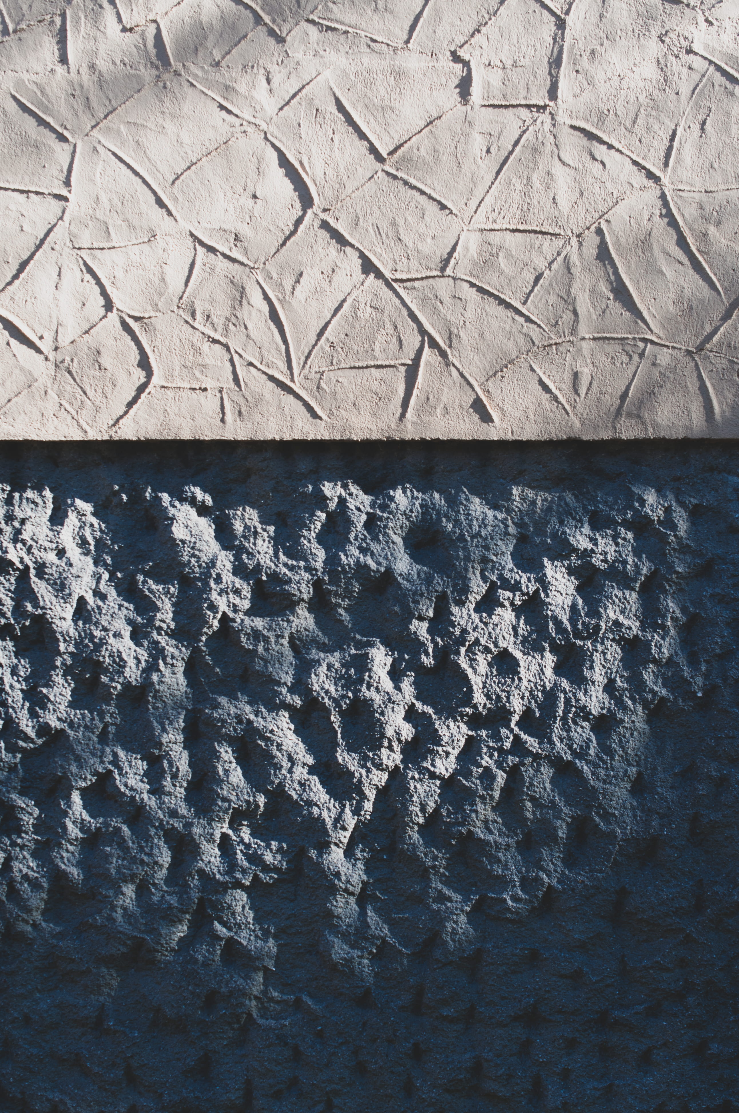 gray concrete wall, no people, day, high angle view, pattern