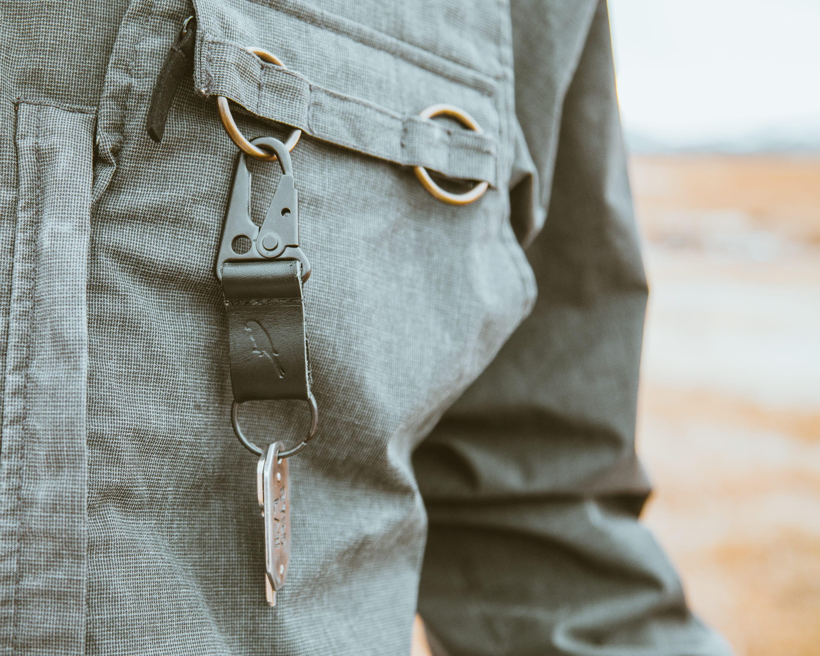 jacket, mountain, explore, keychain, close-up, one person, midsection