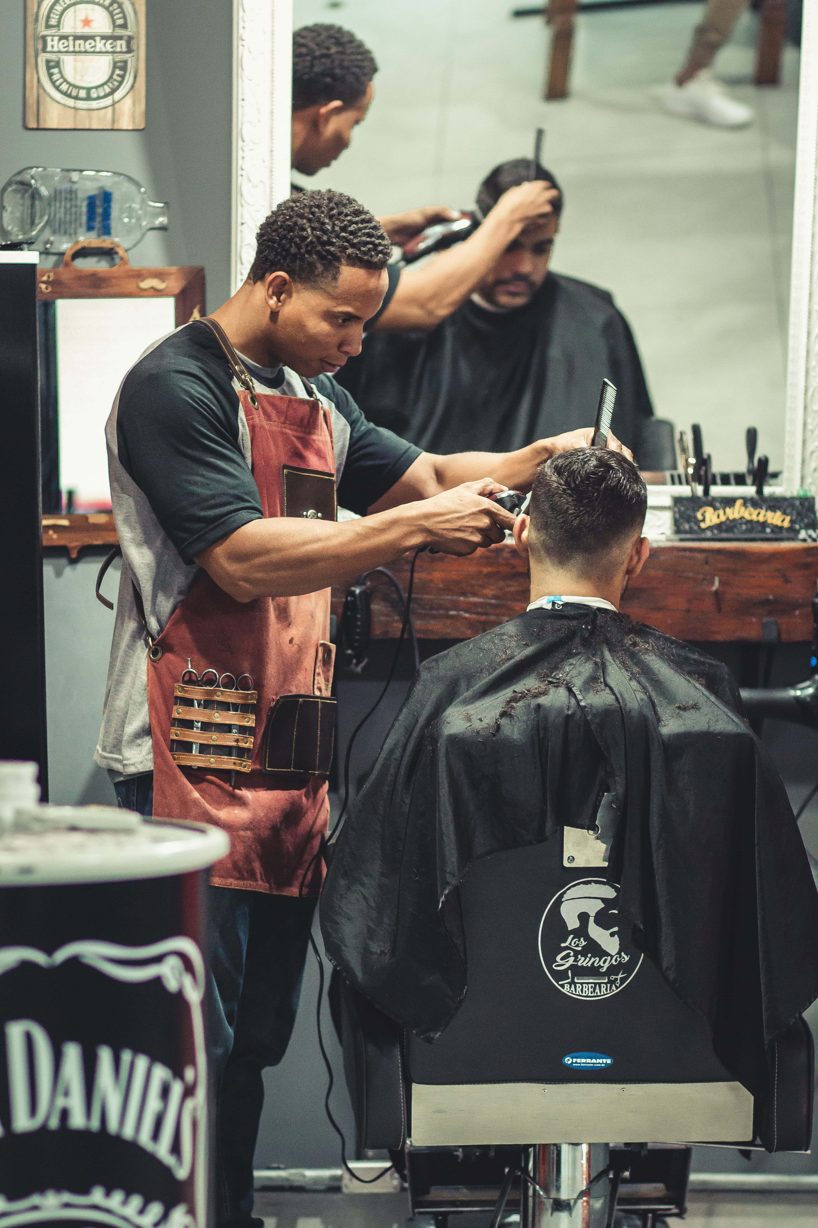 Person Cutting Hair of Man, barber, barbershop, facial expression