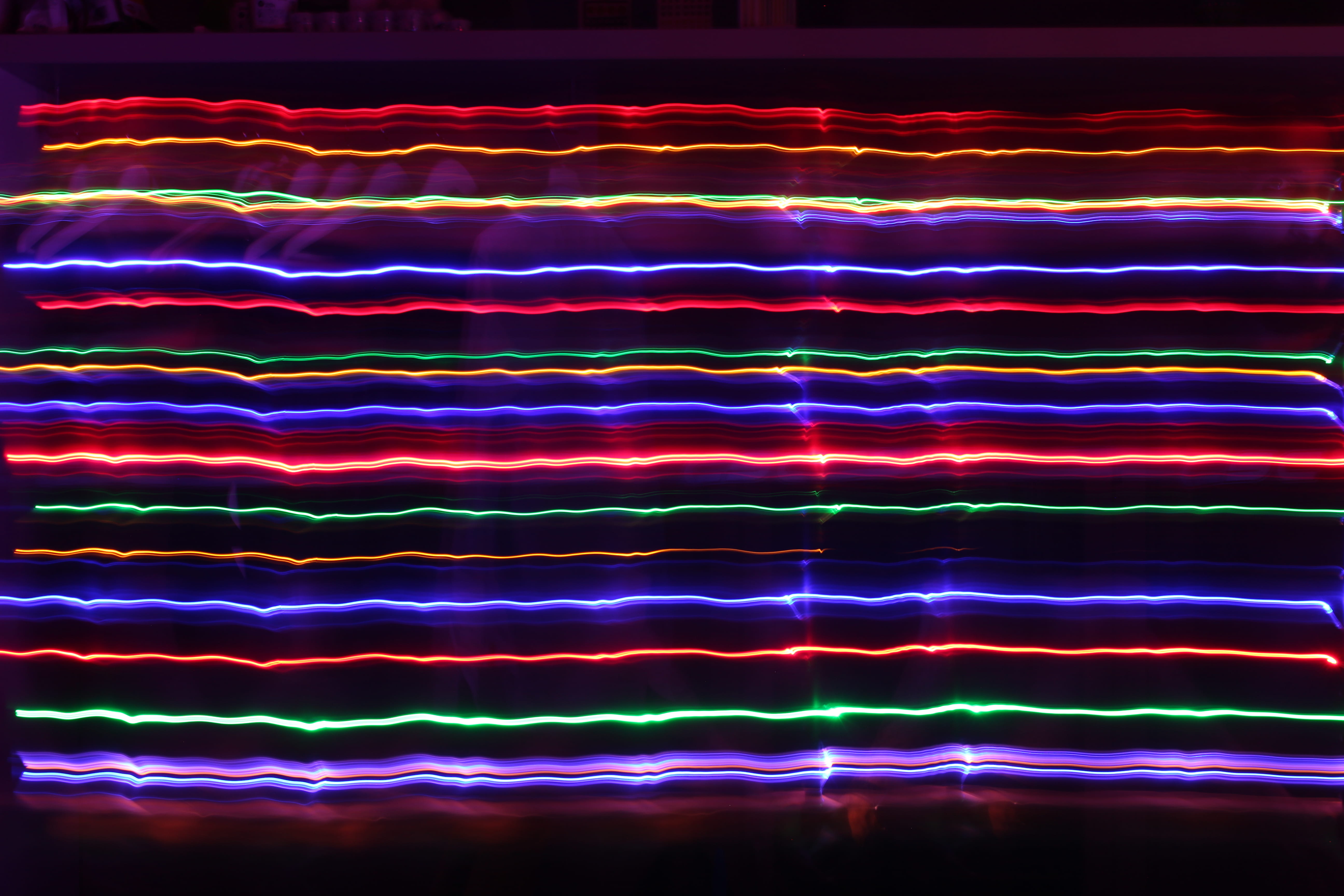 assorted-color light strips, multi colored, illuminated, pattern