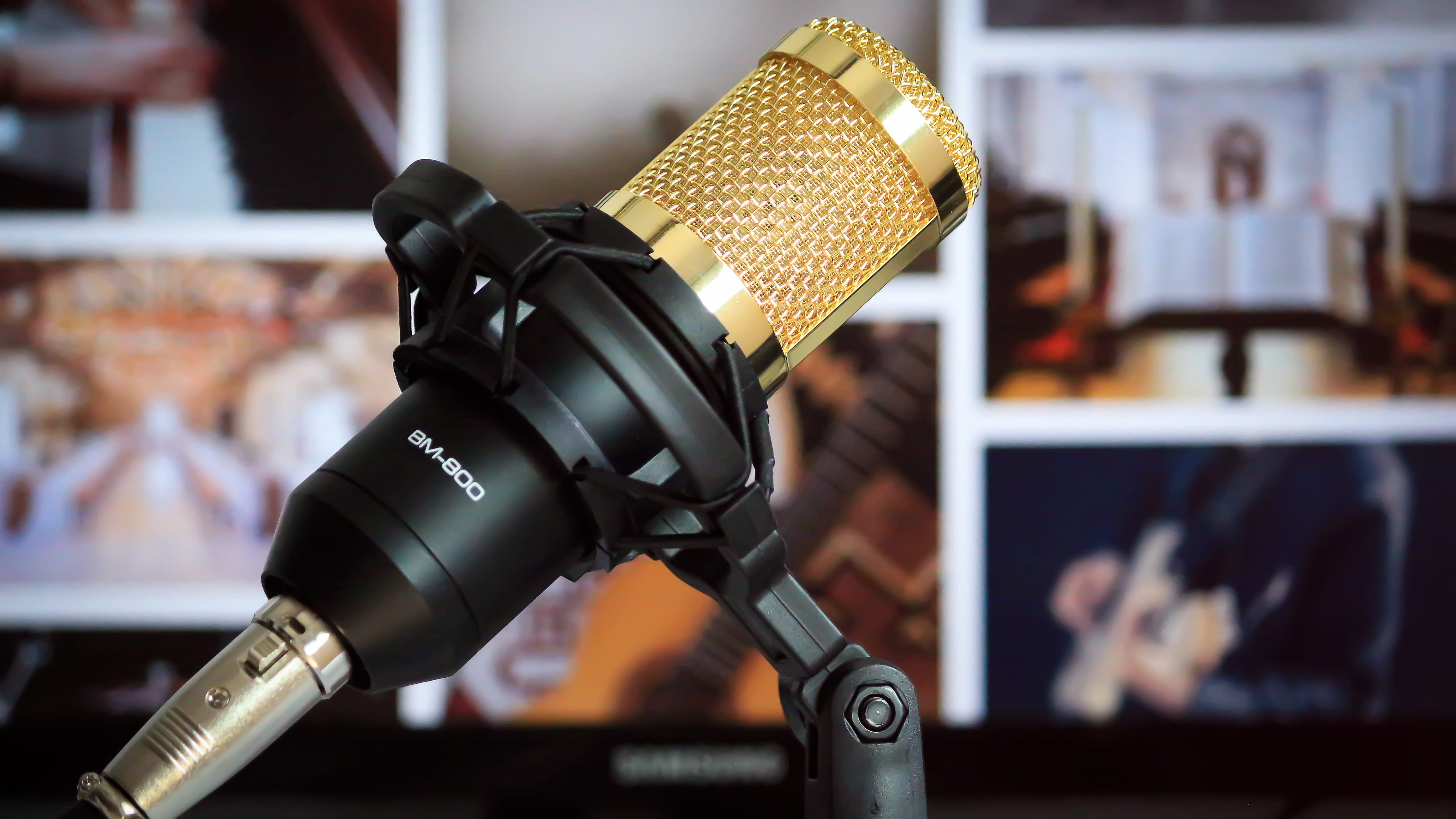 black and brass condenser microphone, technology, focus on foreground