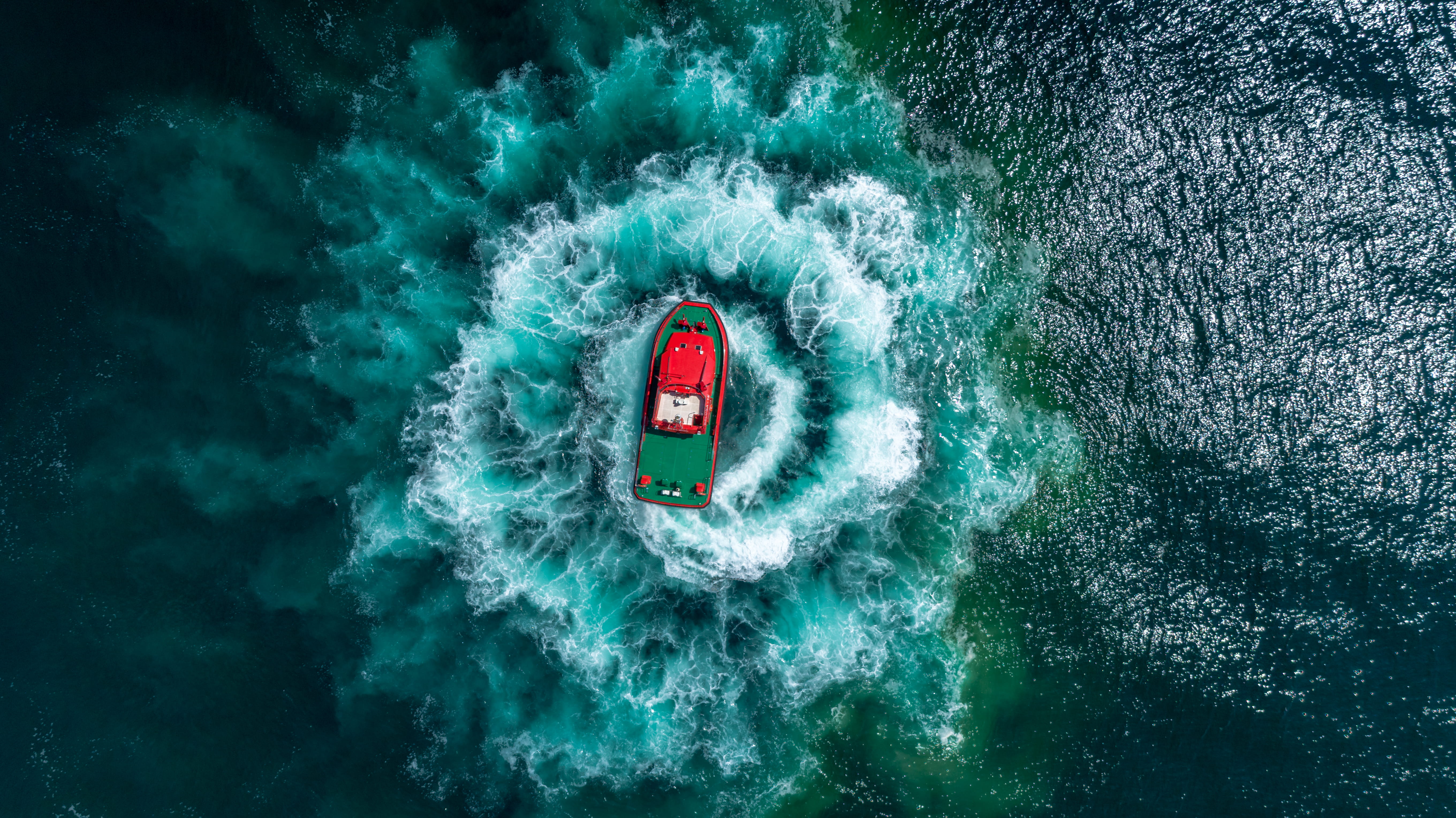 Top View Photo of Boat on Ocean, bird's eye view, drone photography