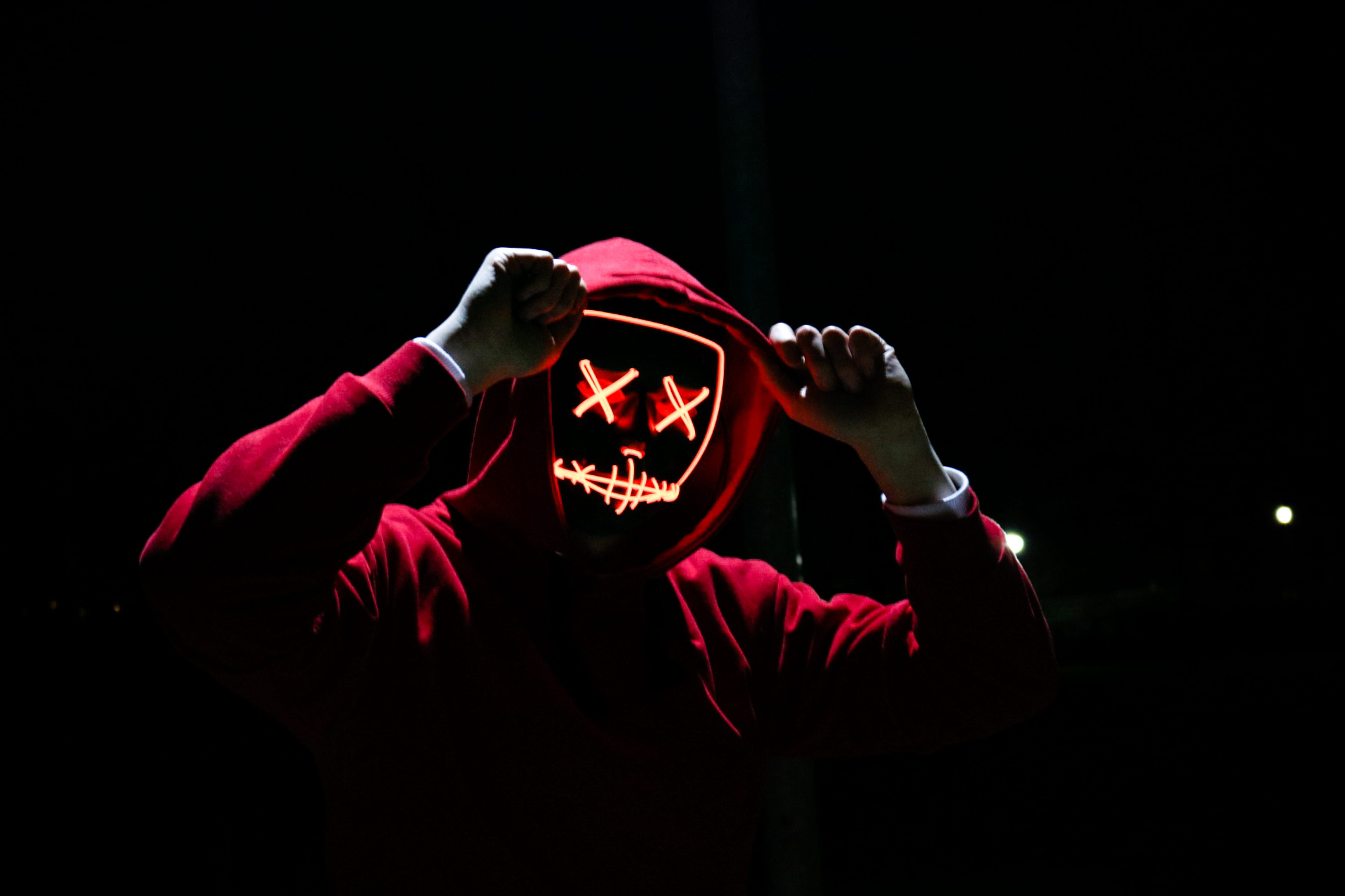 Person Wearing Red Hoodie, black background, costume, dark, eerie