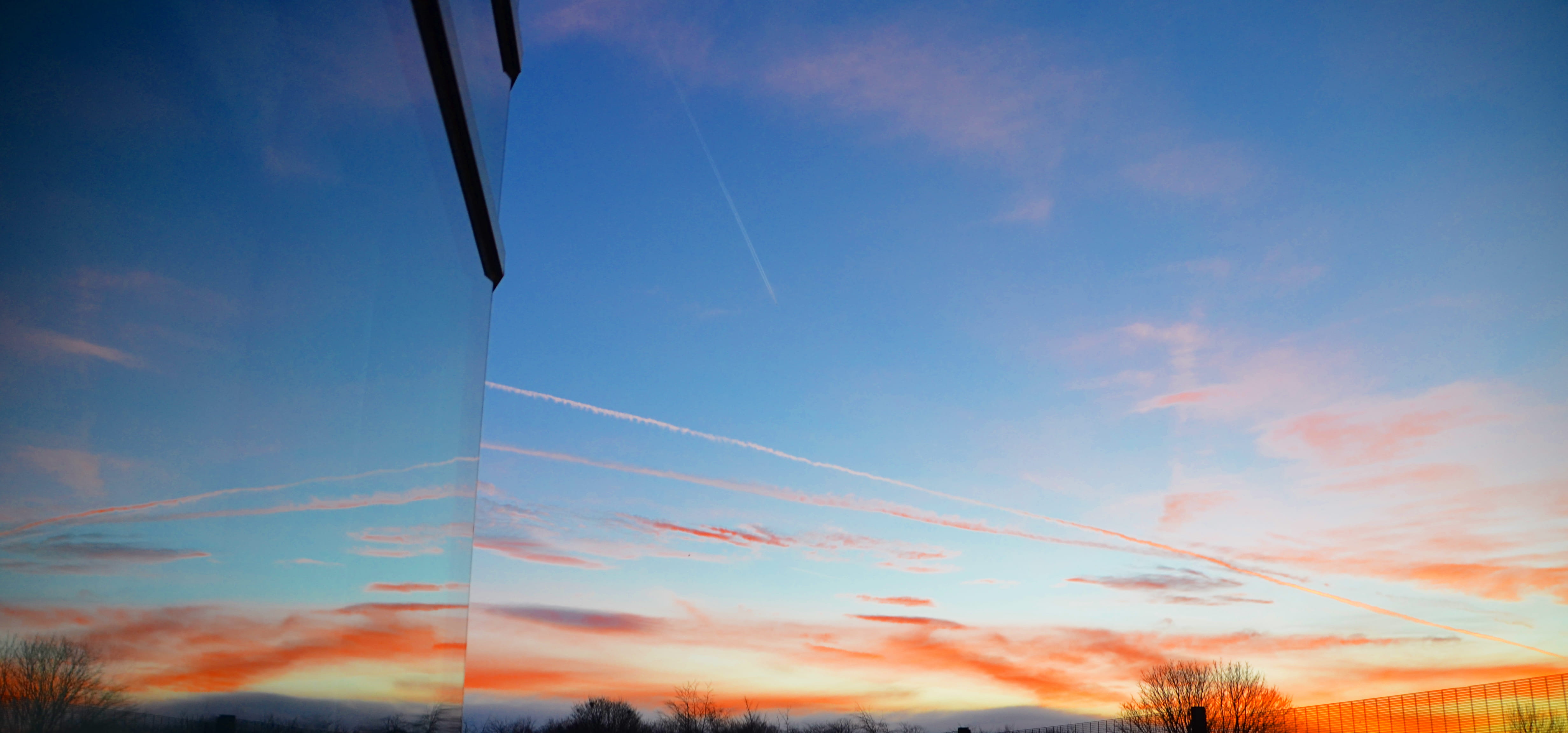 sunset, clouds, reflection, sky, cloud - sky, vapor trail, low angle view