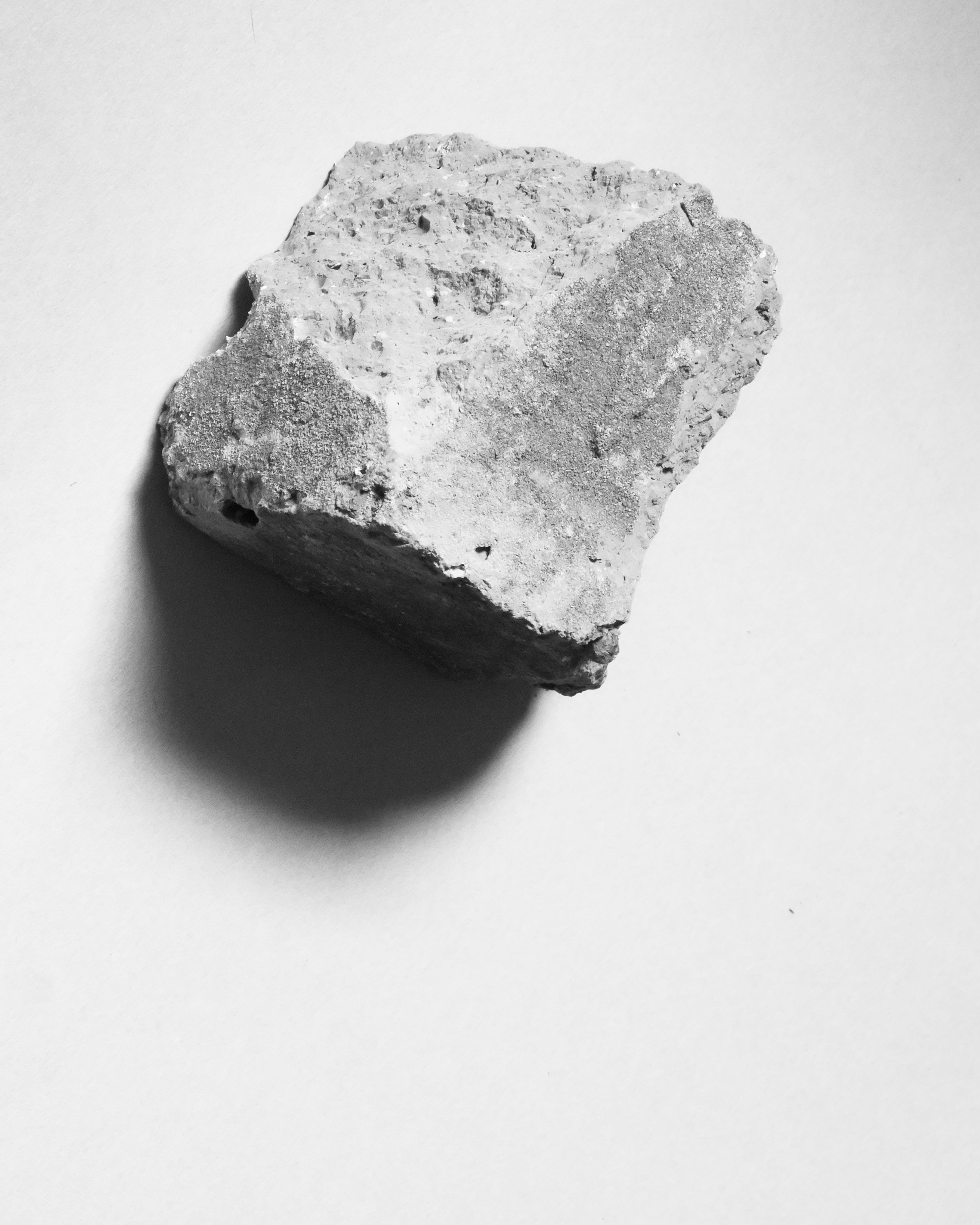 brick, white background, studio shot, solid, indoors, single object