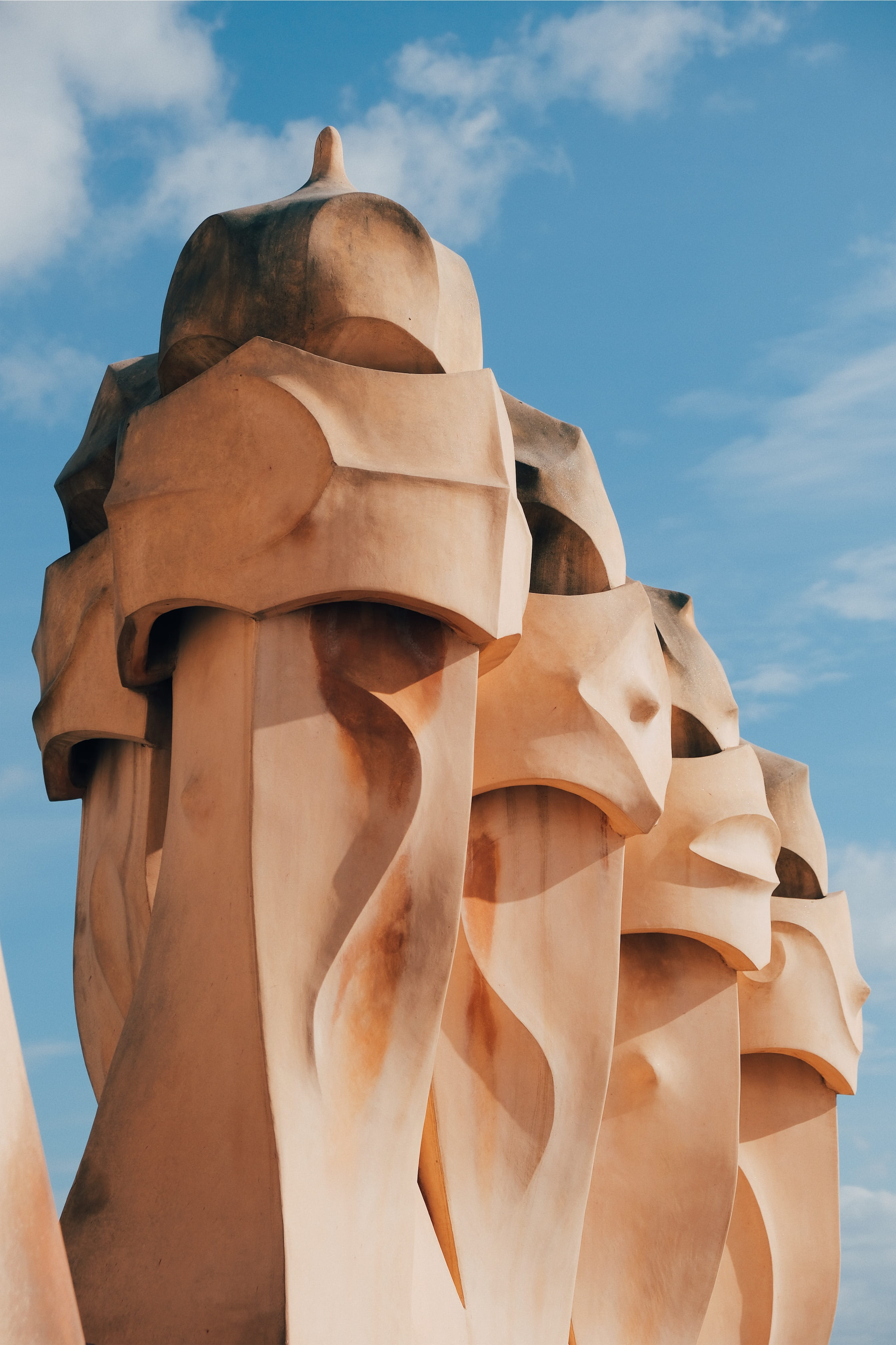 brown statue, sky, cloud - sky, low angle view, art and craft