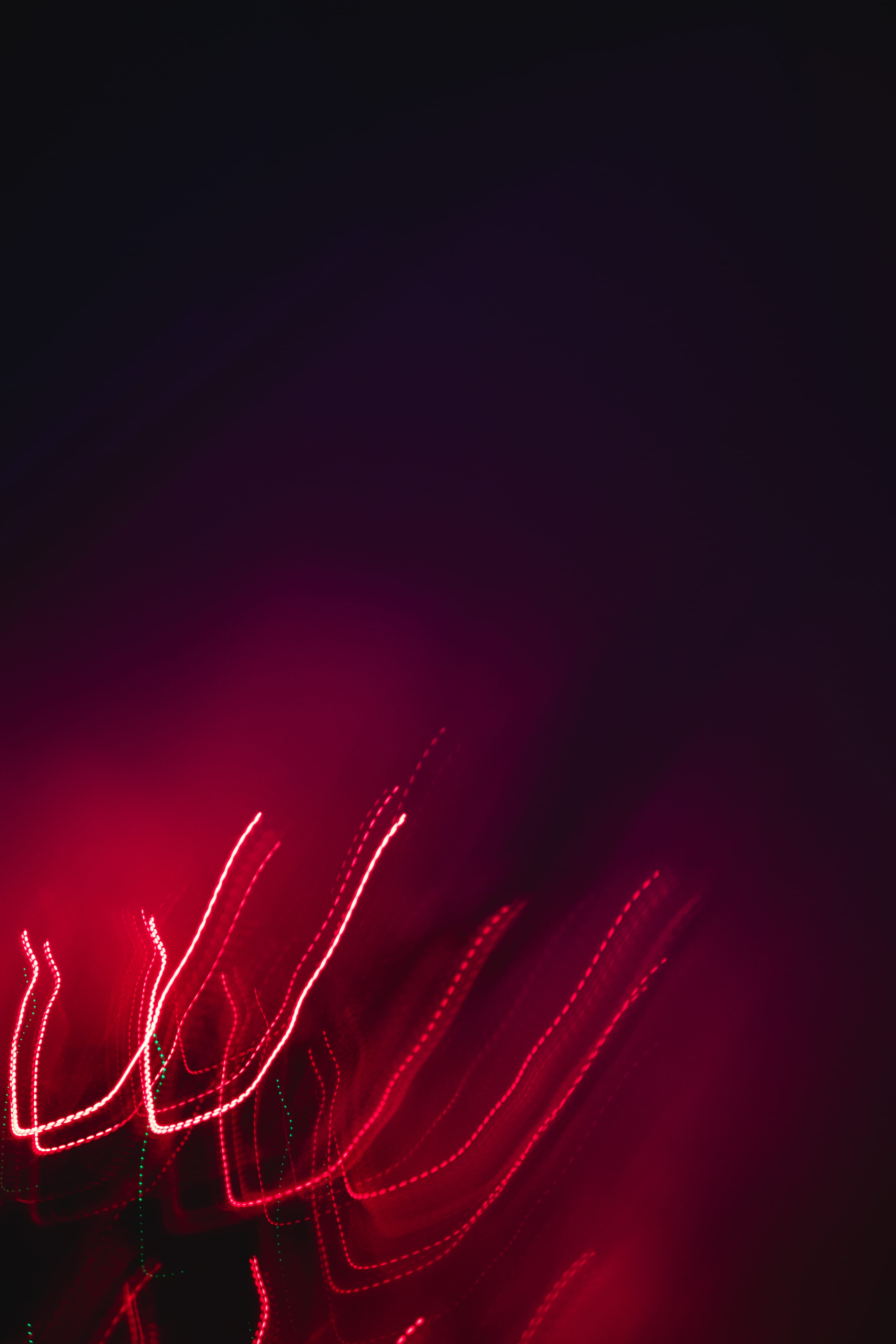 red, studio shot, motion, copy space, colored background, night