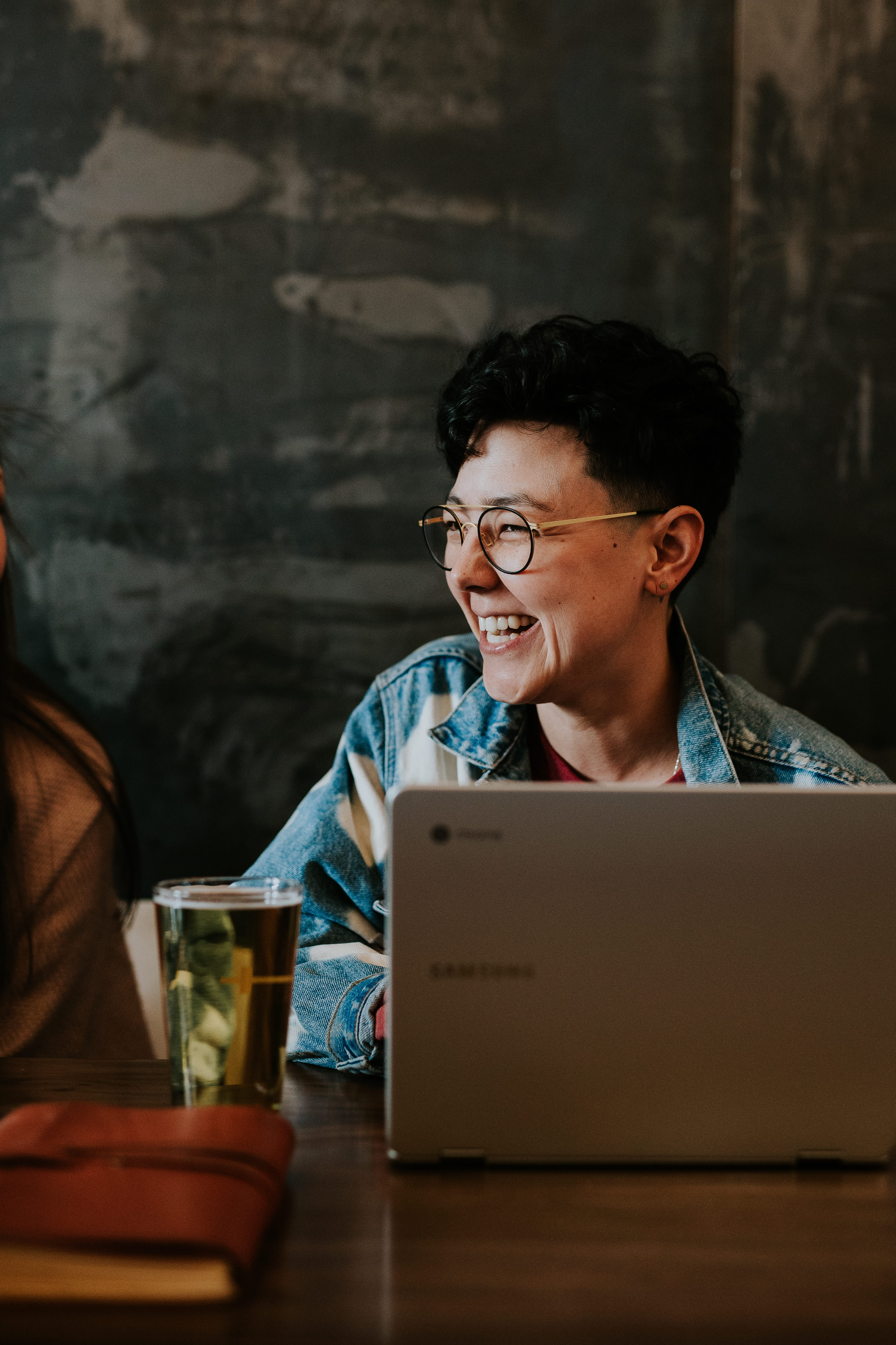 man sitting while using laptop, communication, wireless technology