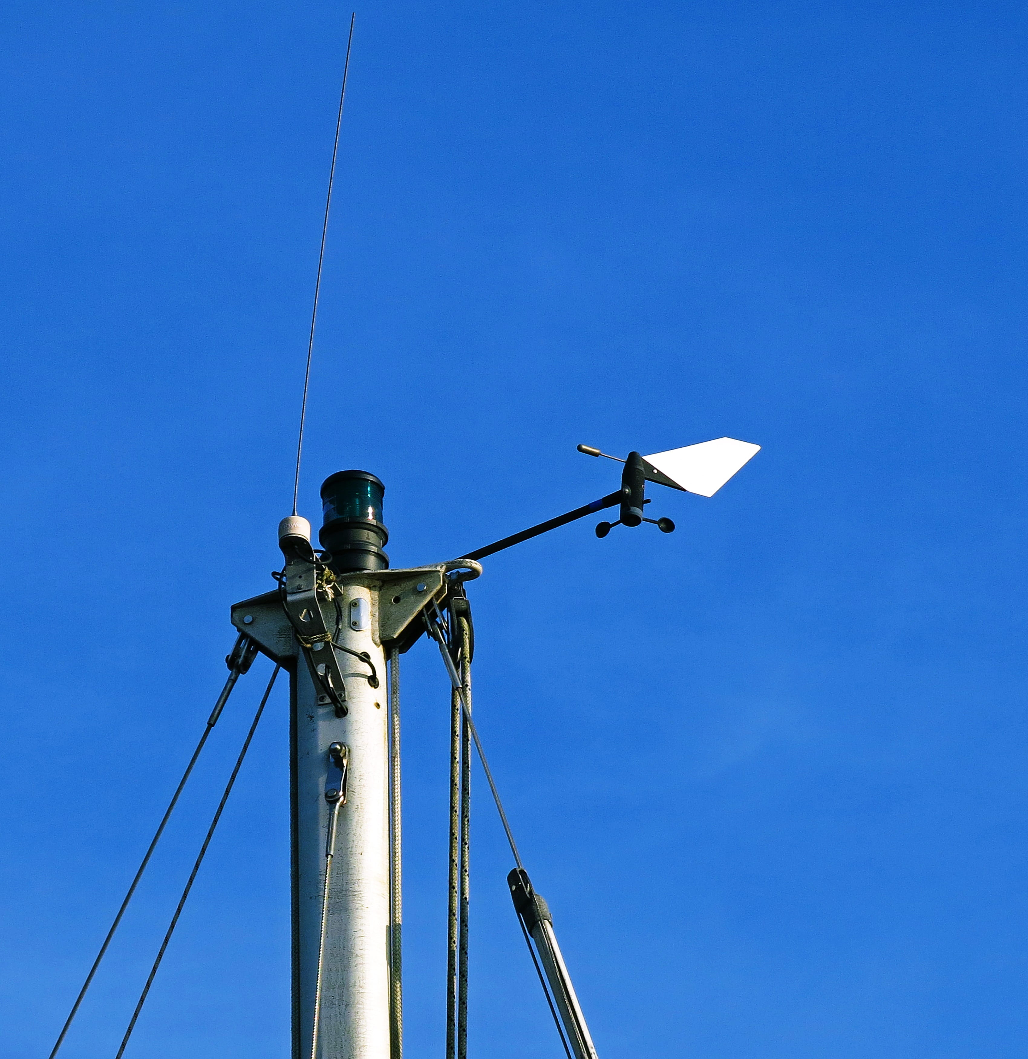 utility pole, lamp post, antenna, electrical device, cable