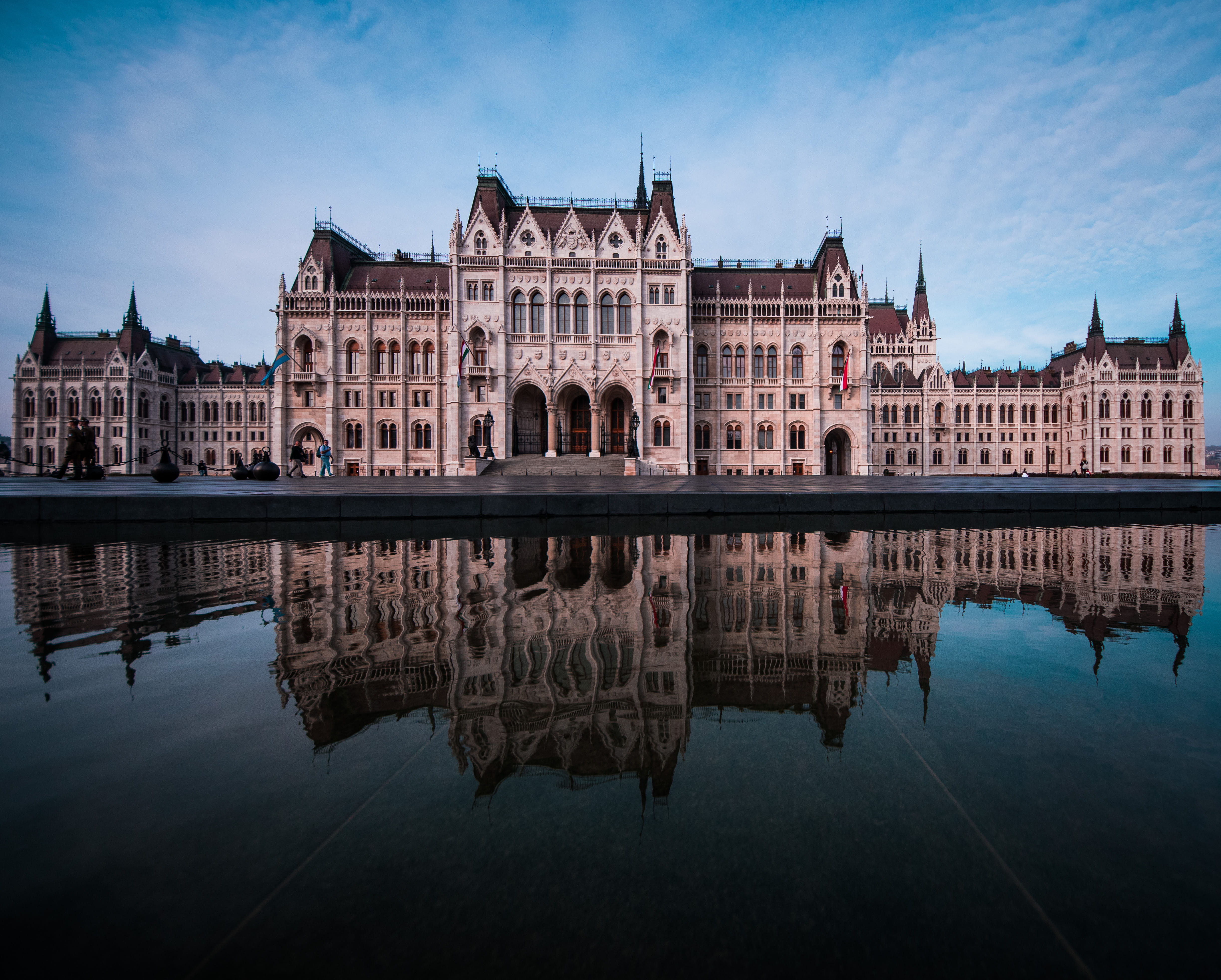 brown concrete structure, building exterior, reflection, built structure