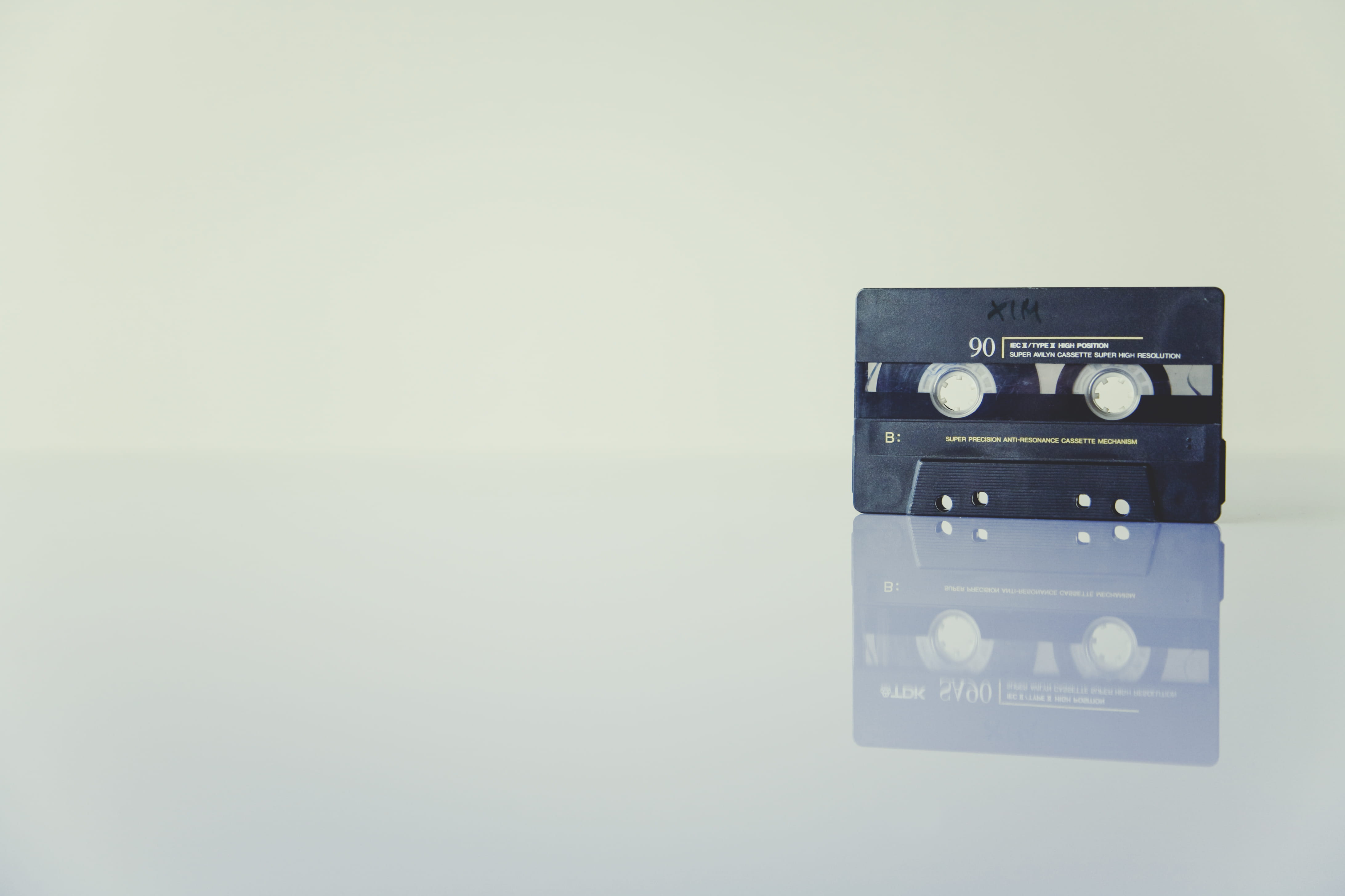 Black Cassette Tape Standing on White Surface, music, record