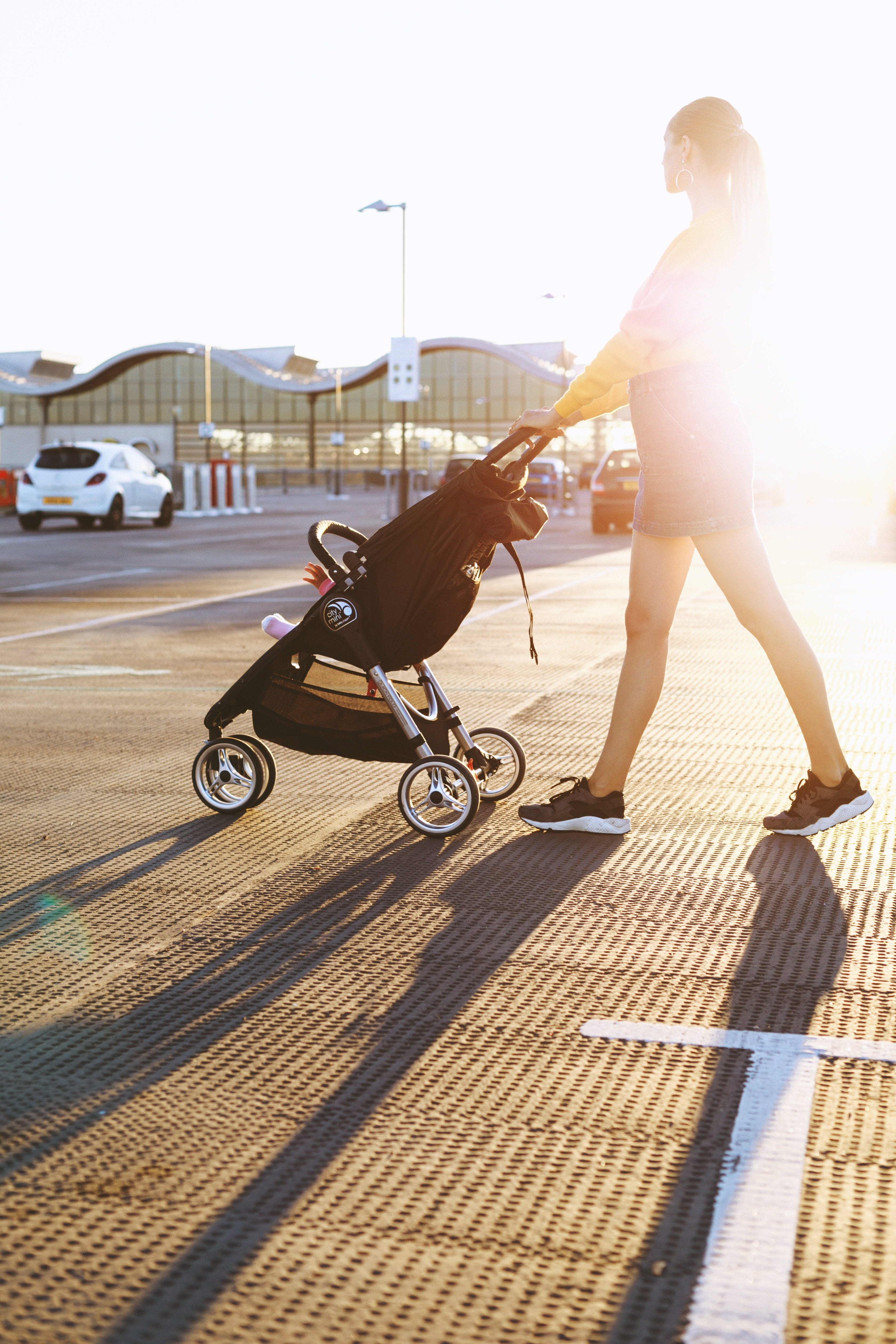 Photo of Woman Pushing a Stroller, adult, daylight, female, lady