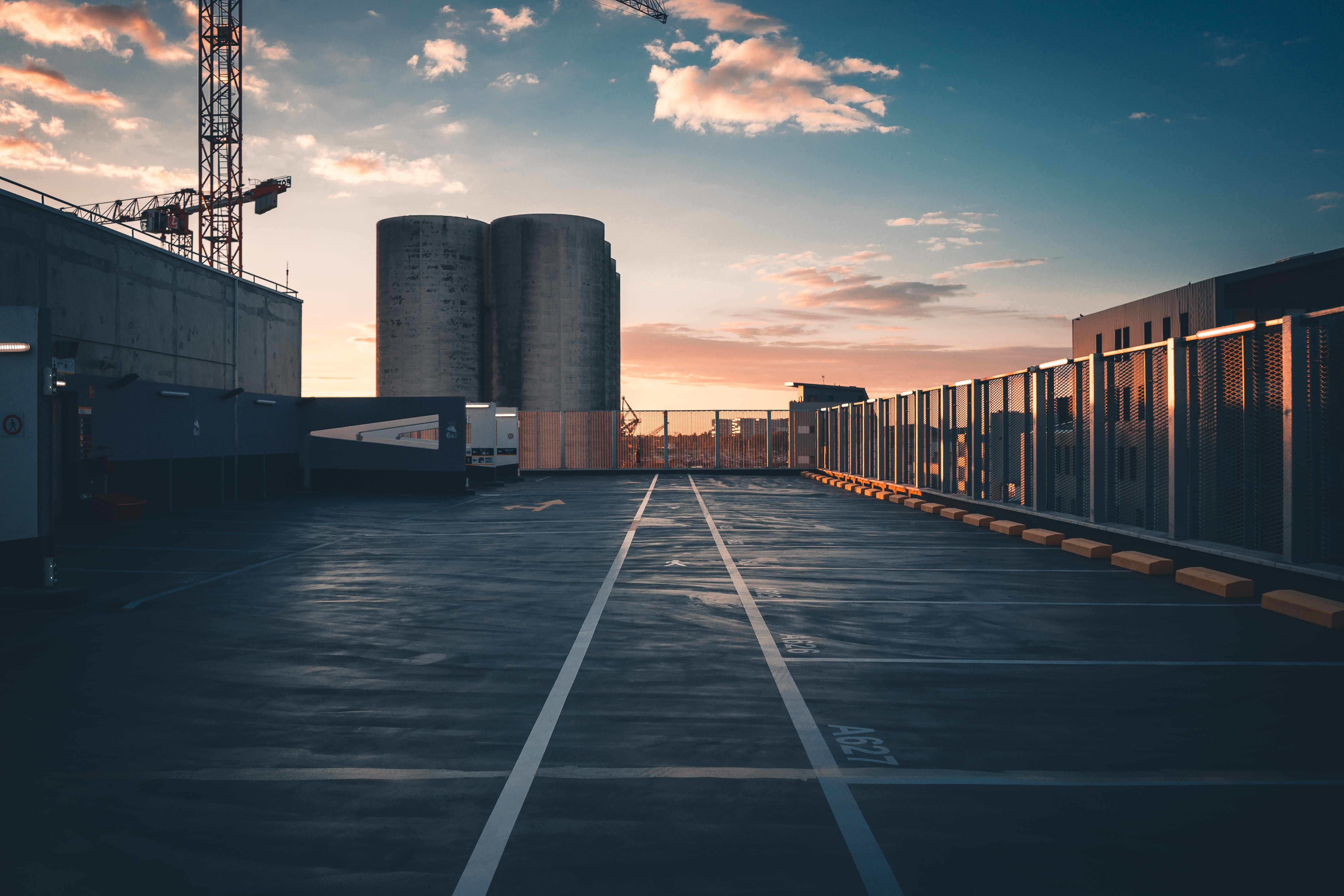 black road, sky, architecture, cloud - sky, built structure, rail transportation