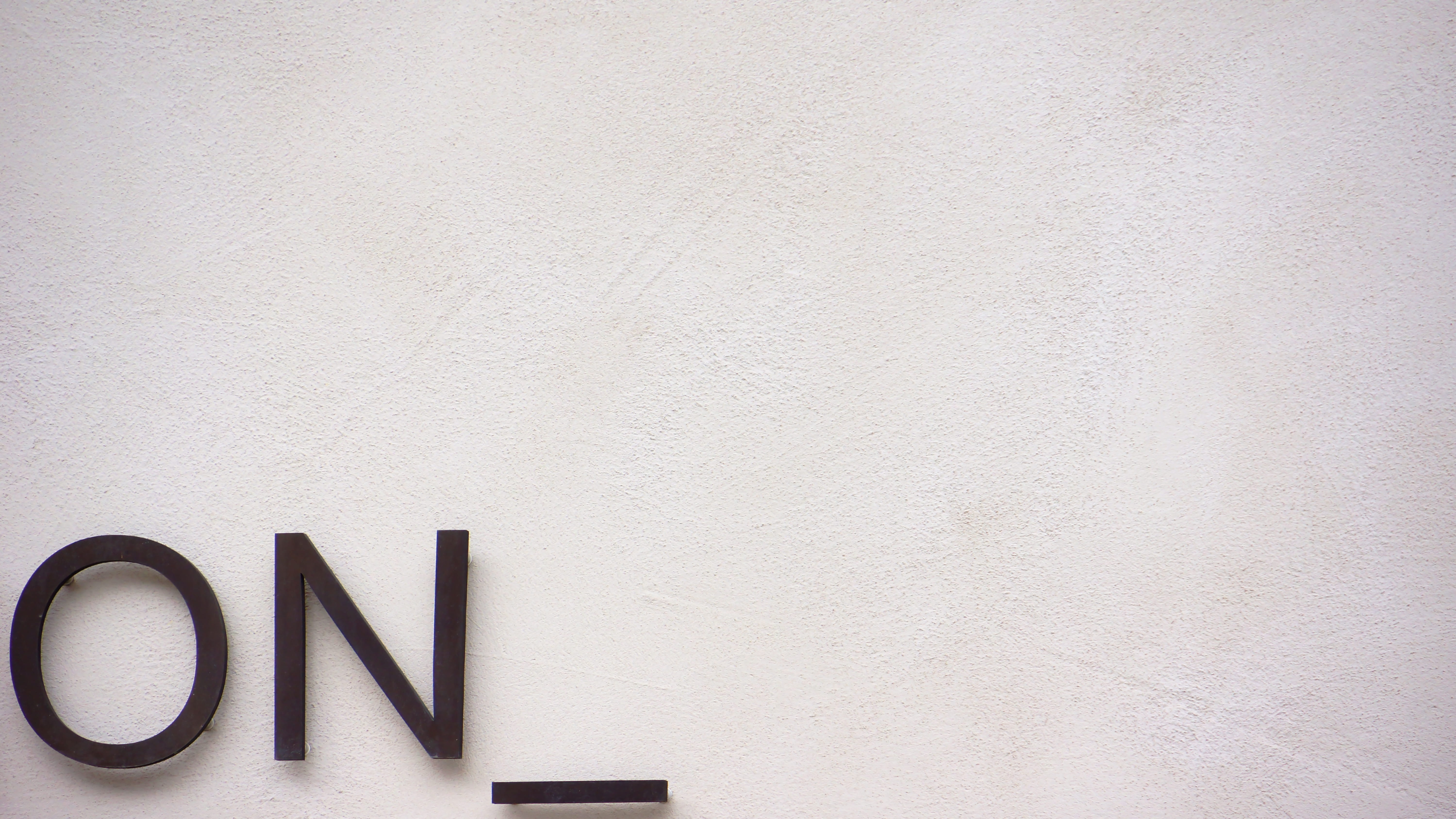 On wall decor, text, communication, wall - building feature, western script
