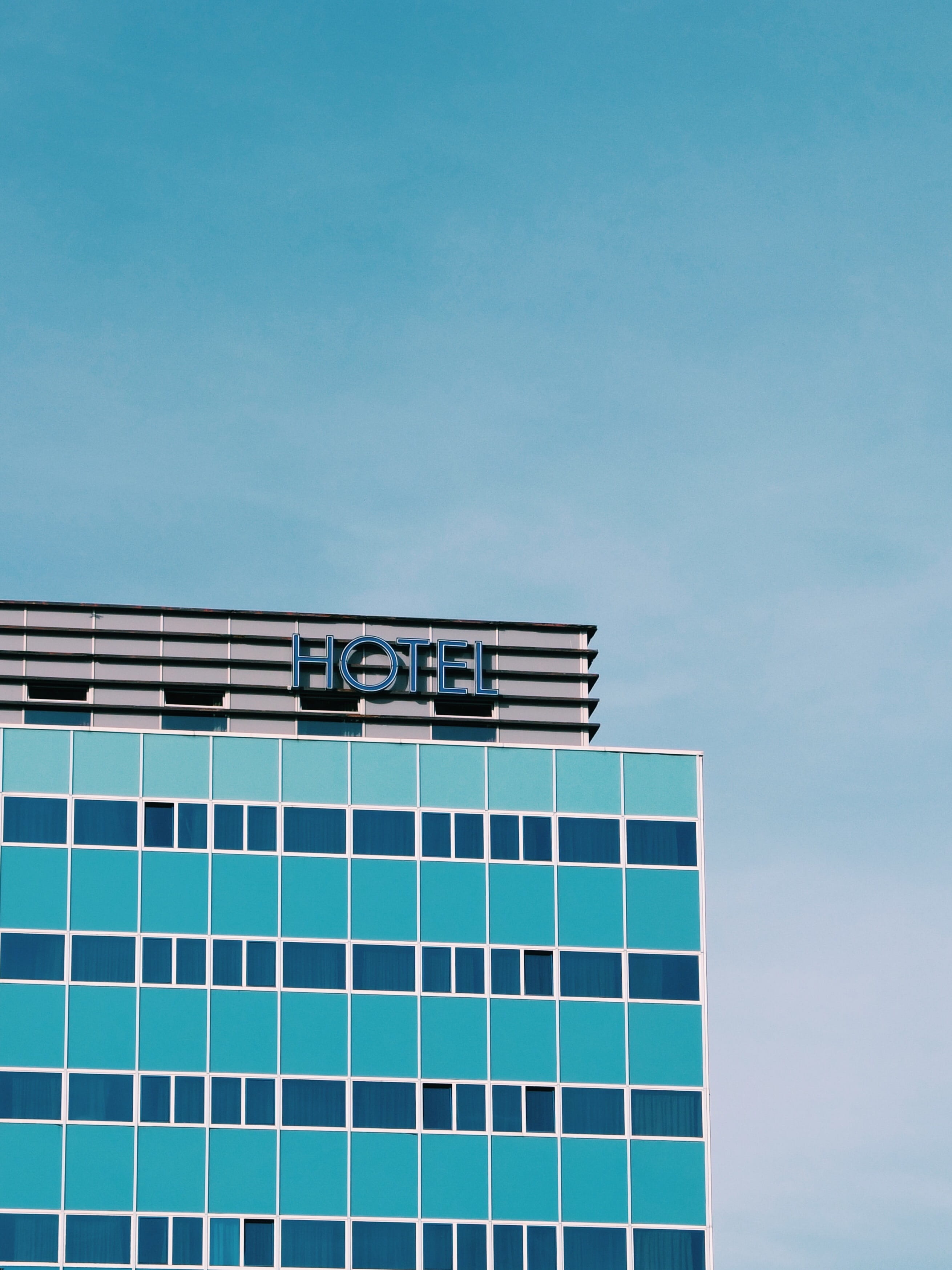 hotel during daytime, sky, architecture, built structure, building exterior